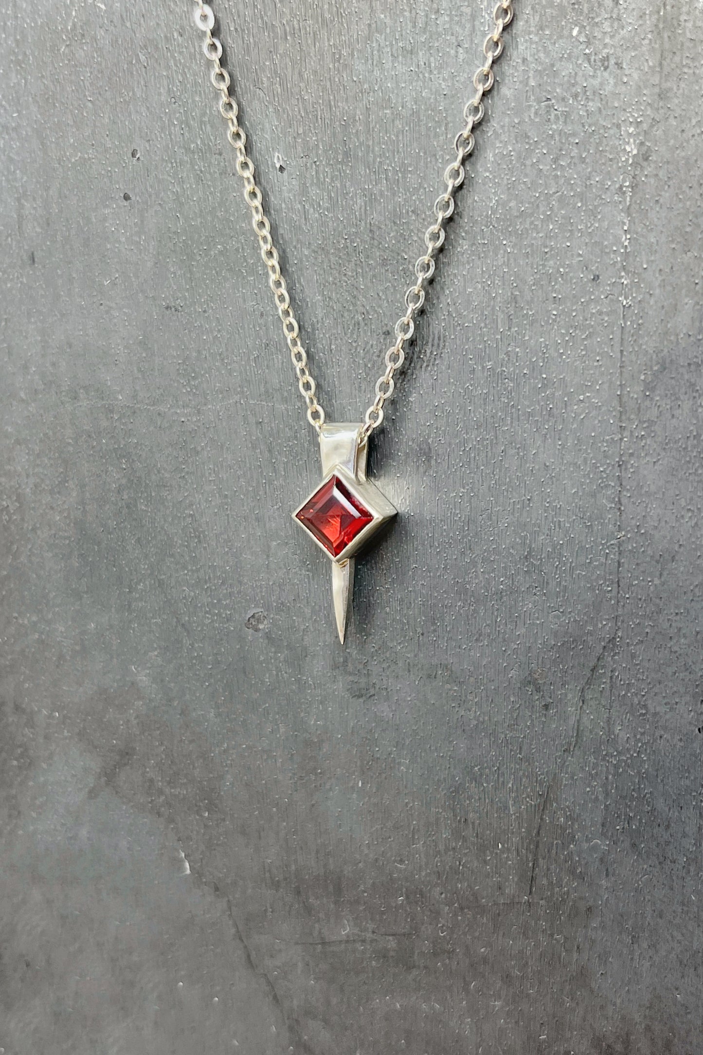 tiny square spike / garnet