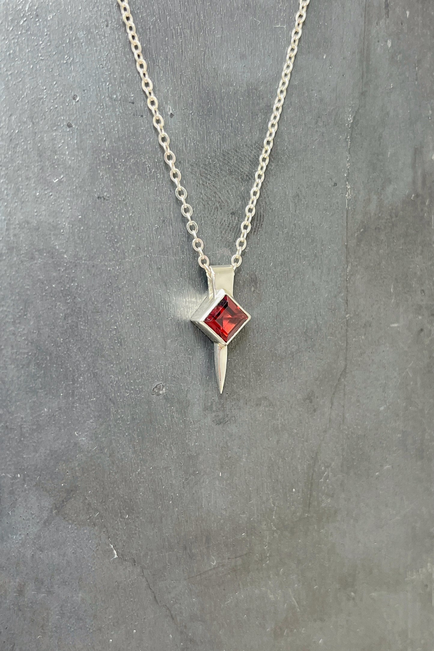tiny square spike / garnet