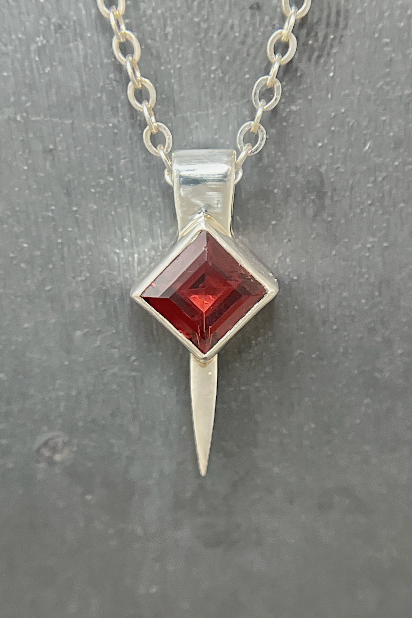 tiny square spike / garnet