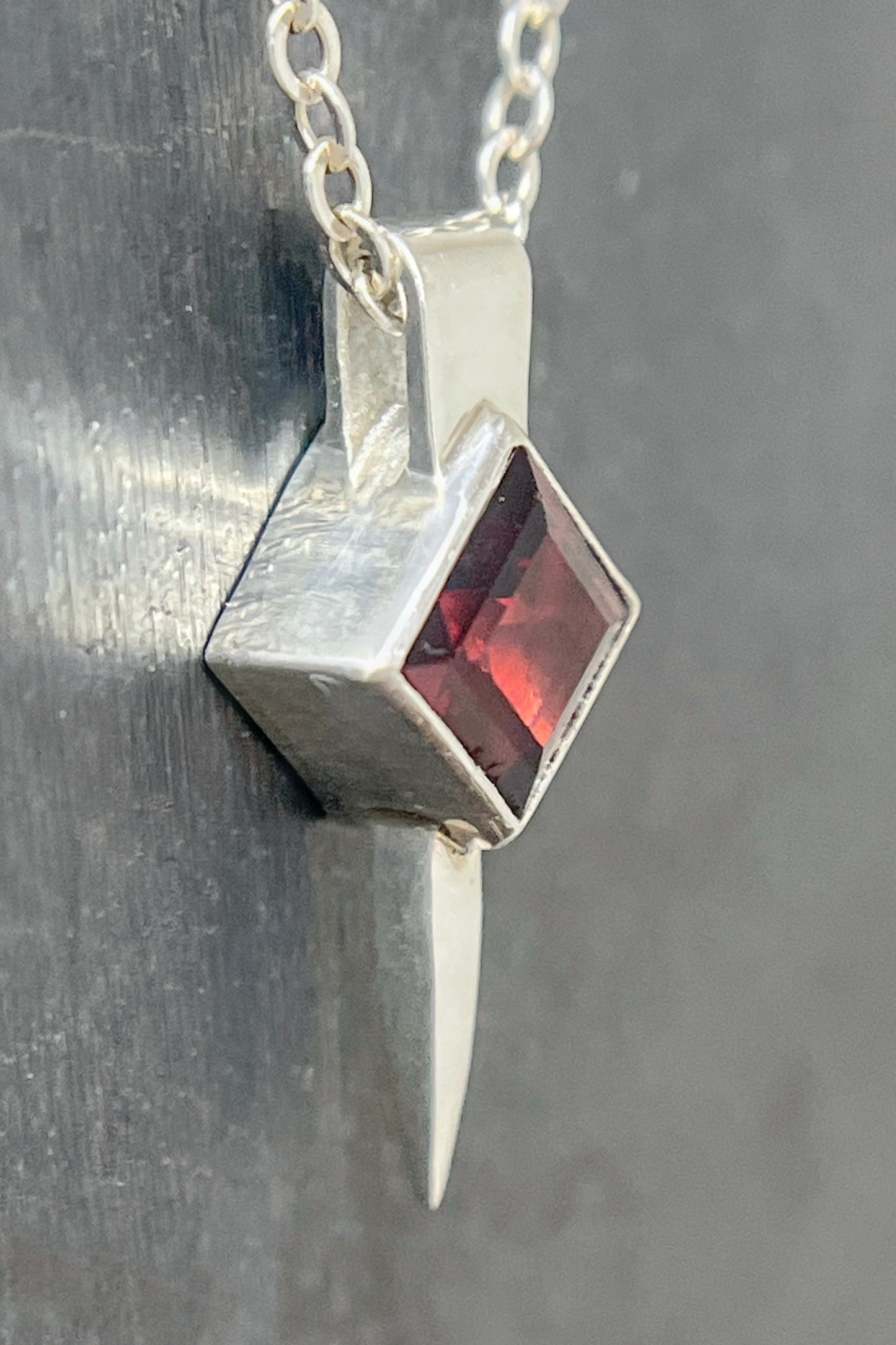 tiny square spike / garnet