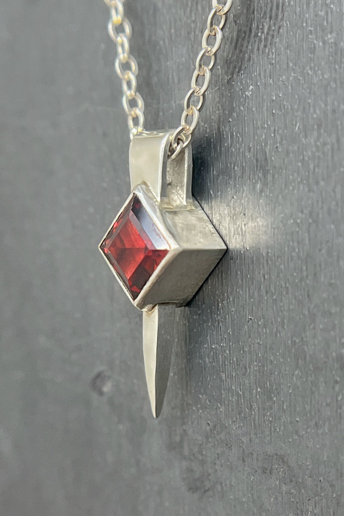 tiny square spike / garnet