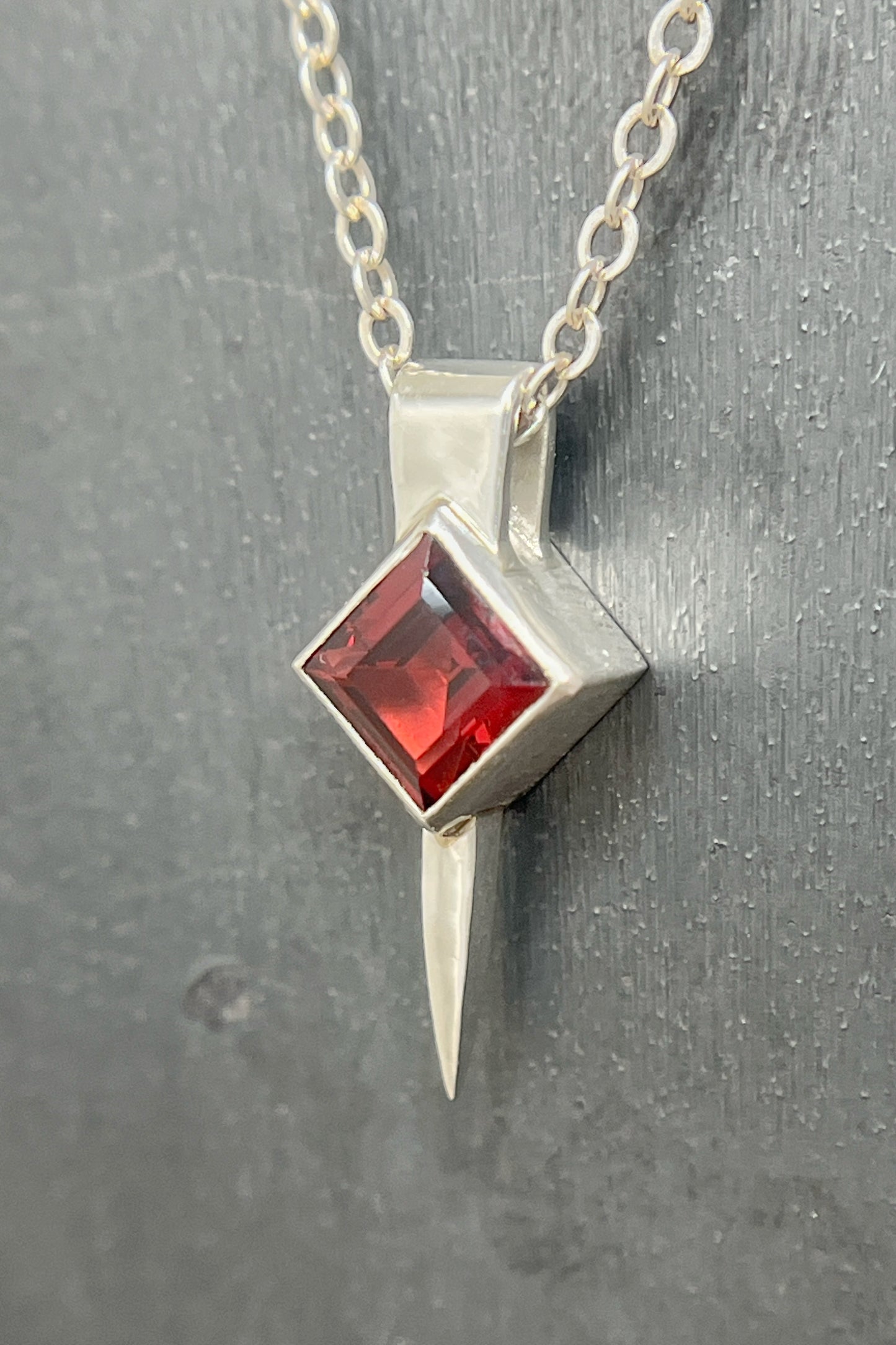 tiny square spike / garnet
