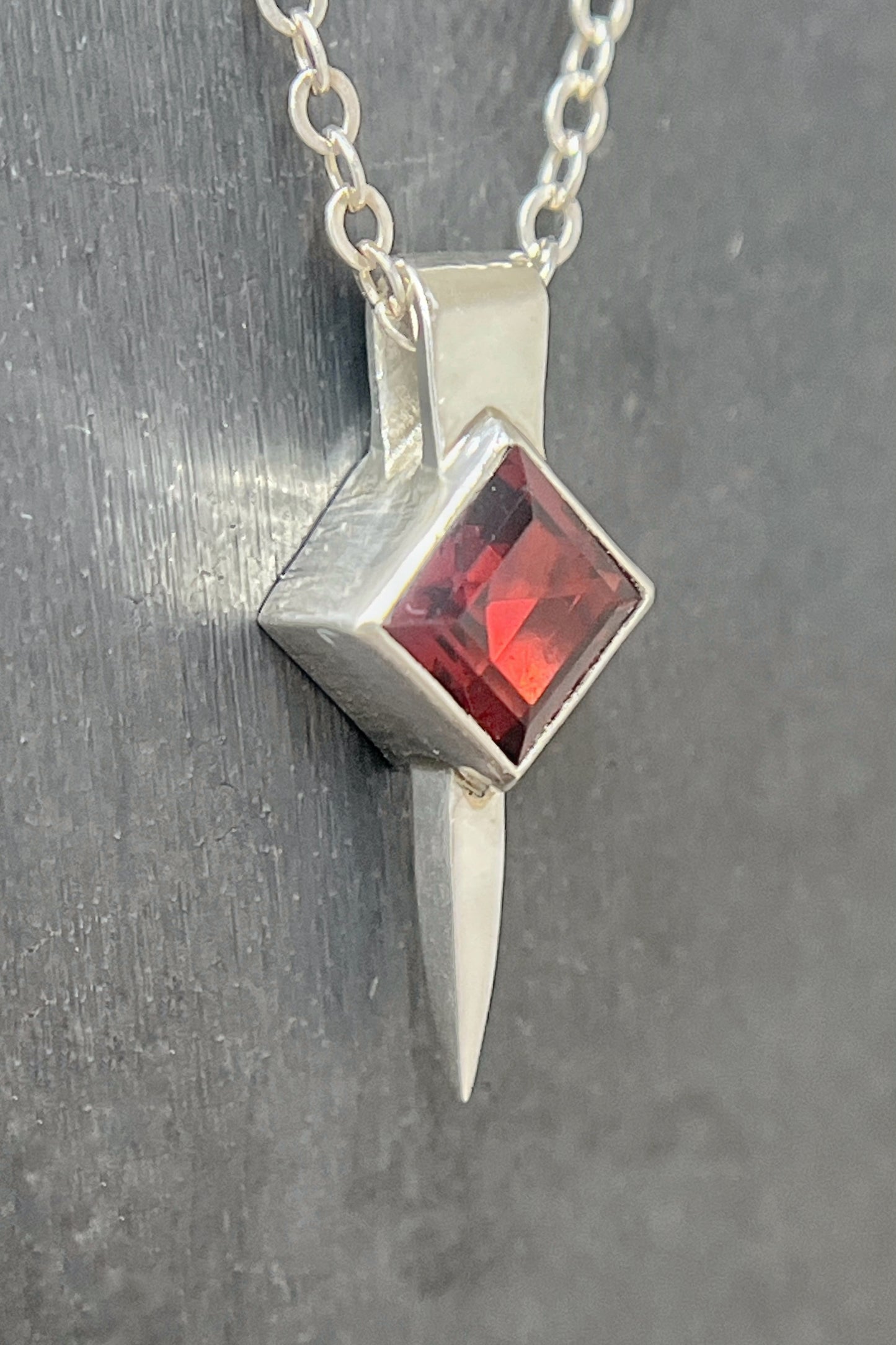tiny square spike / garnet