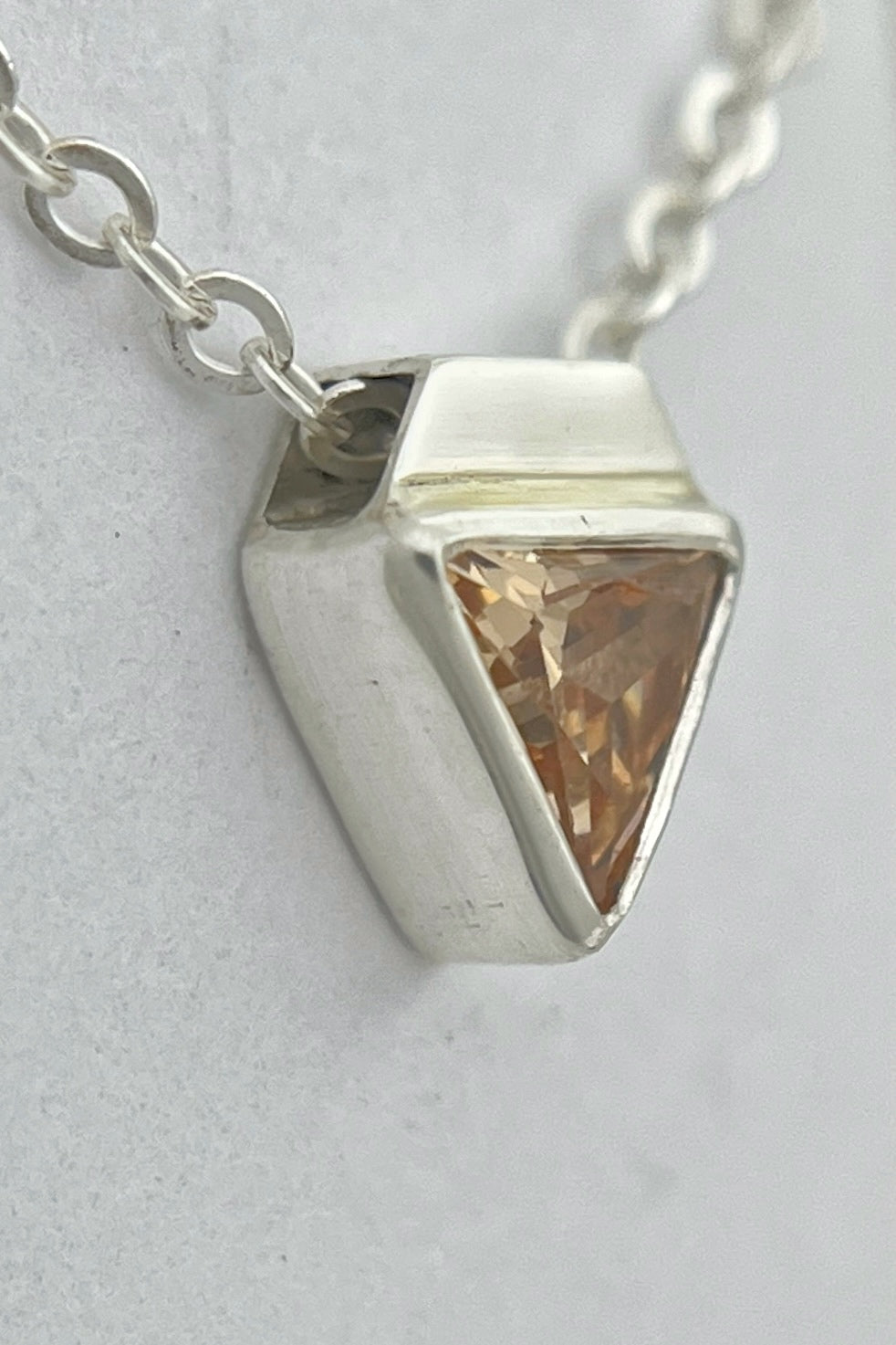 tiny triangle necklace / orange cubic zirconia