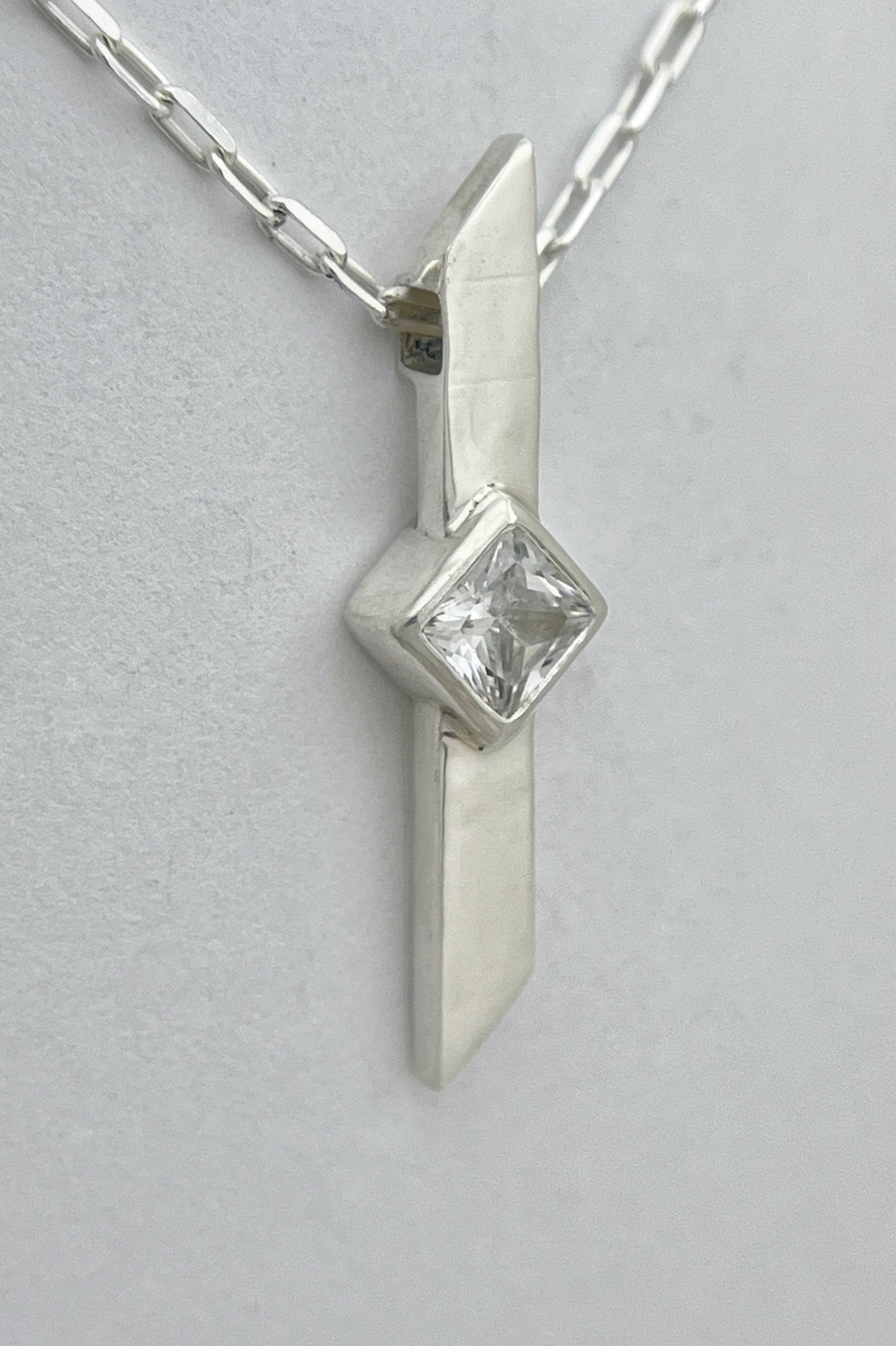 warp necklace / white cubic zirconia