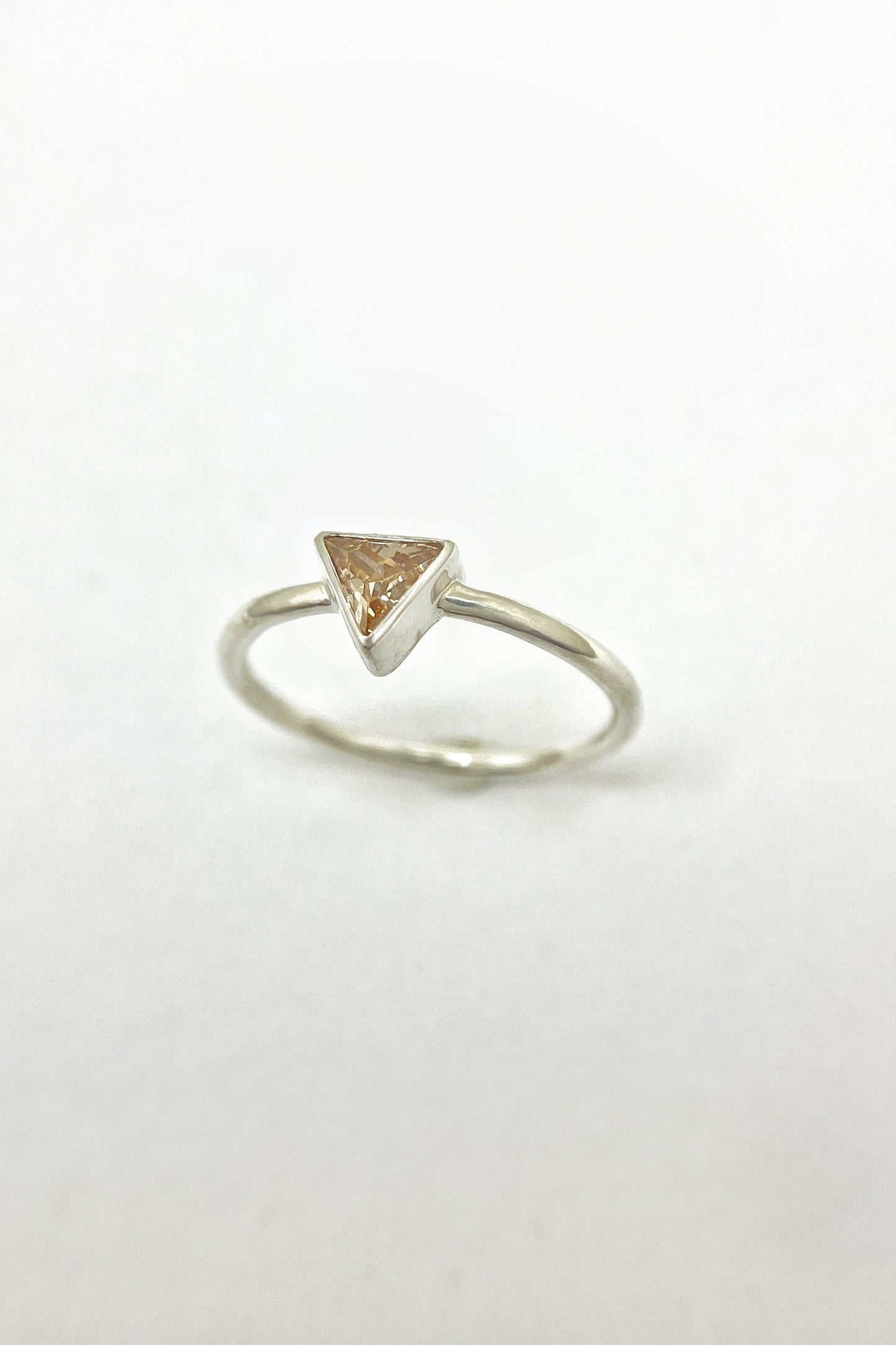 tiny triangle ring / orange cubic zirconia / size 8