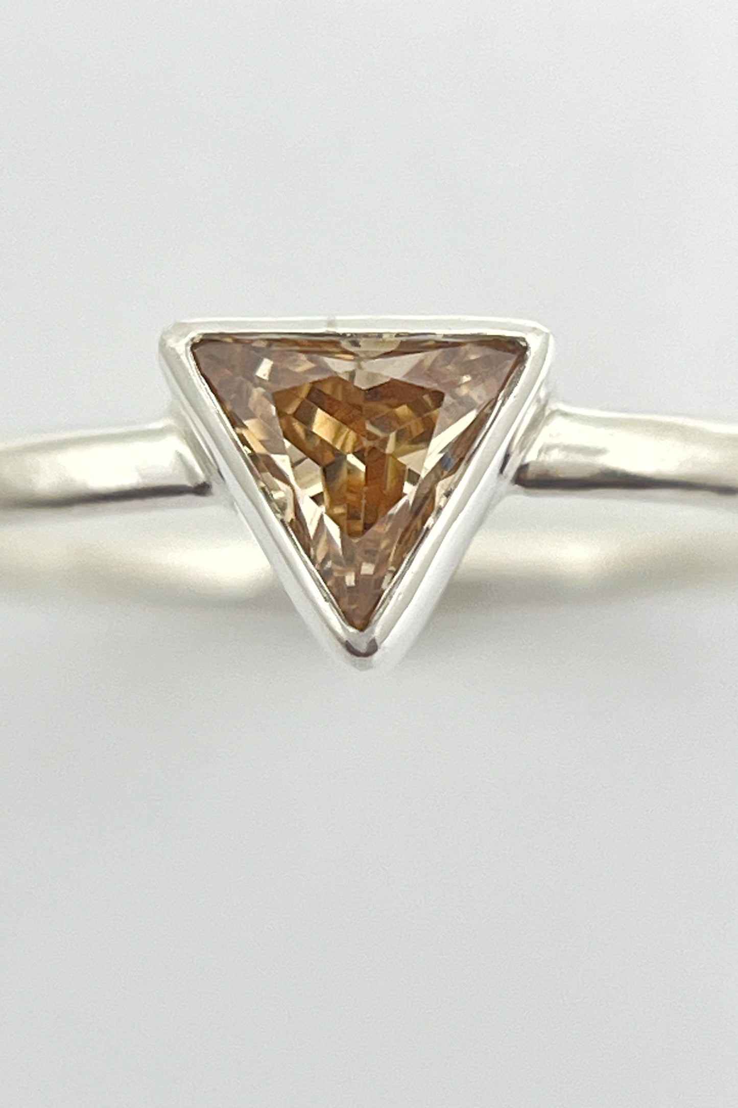 tiny triangle ring / orange cubic zirconia / size 8