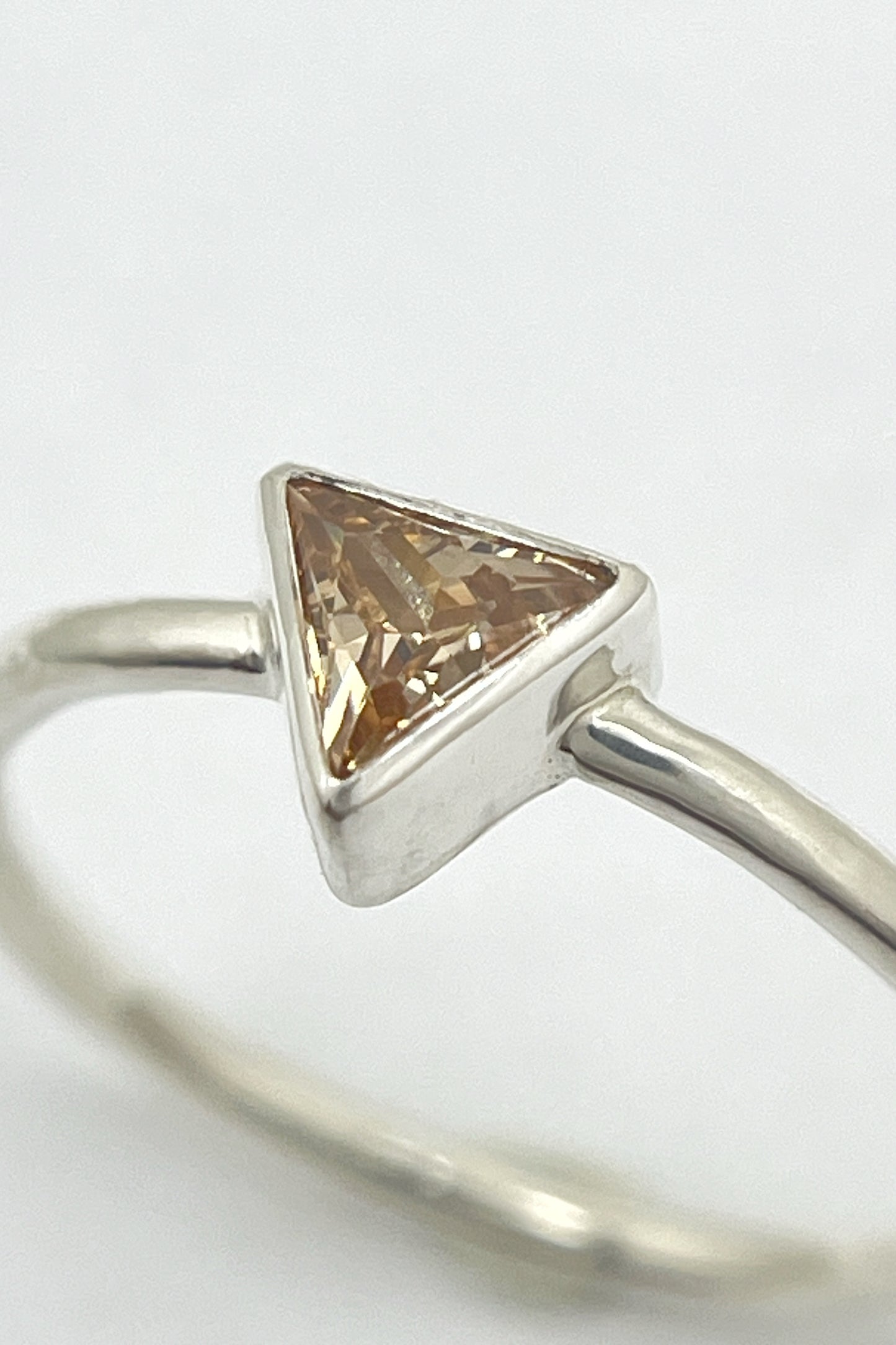 tiny triangle ring / orange cubic zirconia / size 8