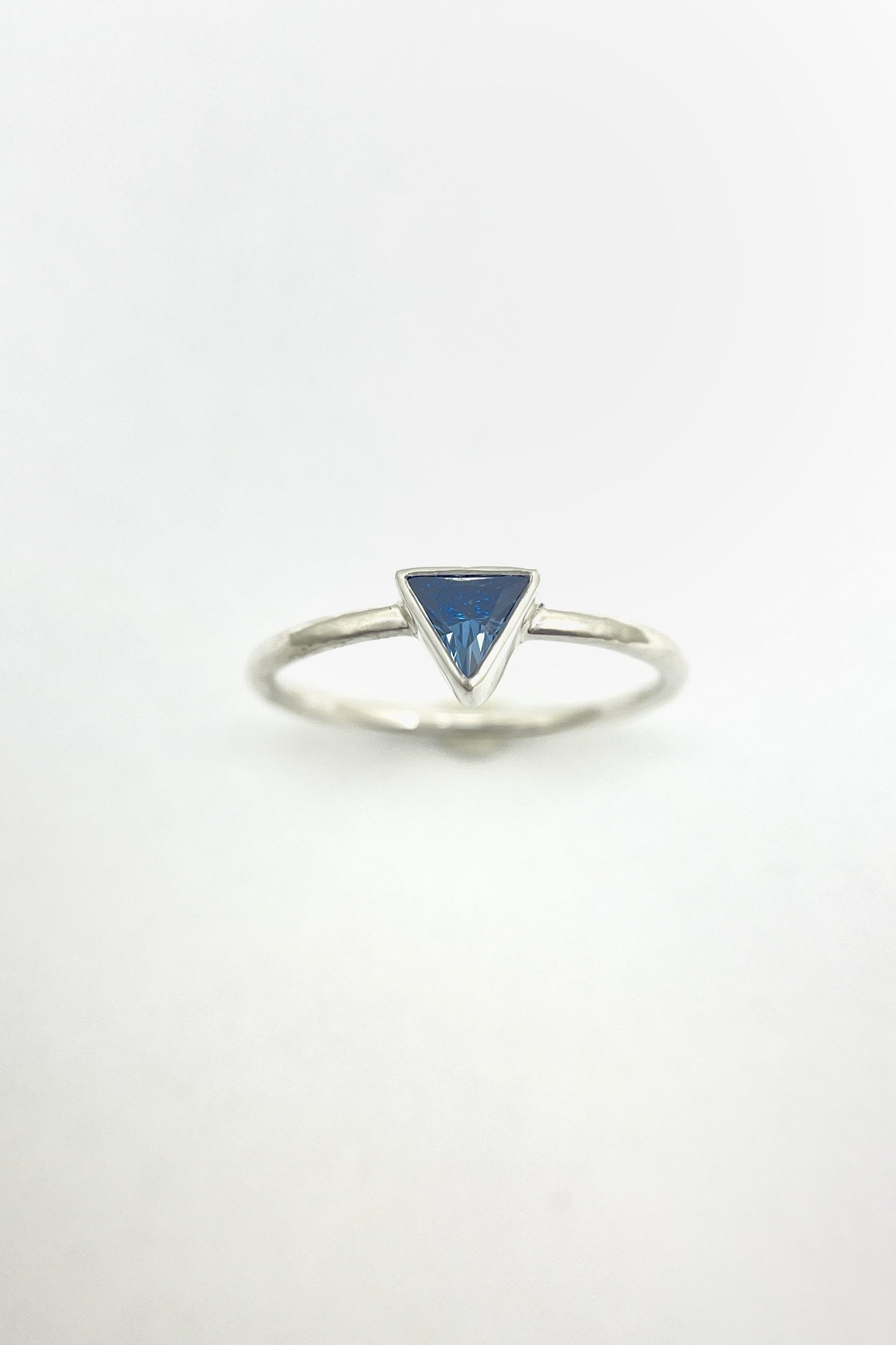 tiny triangle ring / blue cubic zirconia / size 8.5