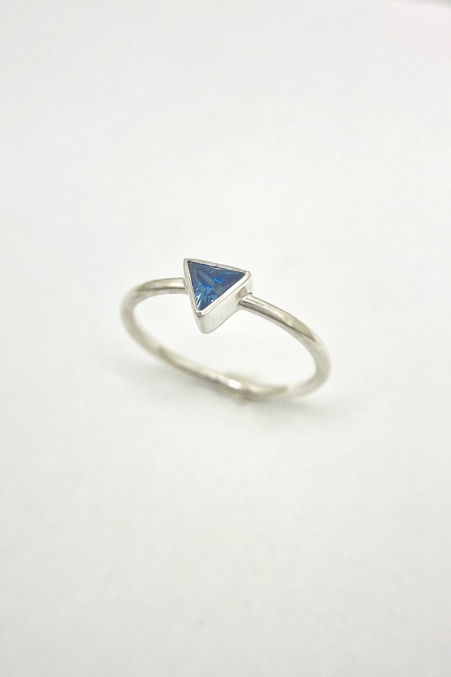 tiny triangle ring / blue cubic zirconia / size 8.5