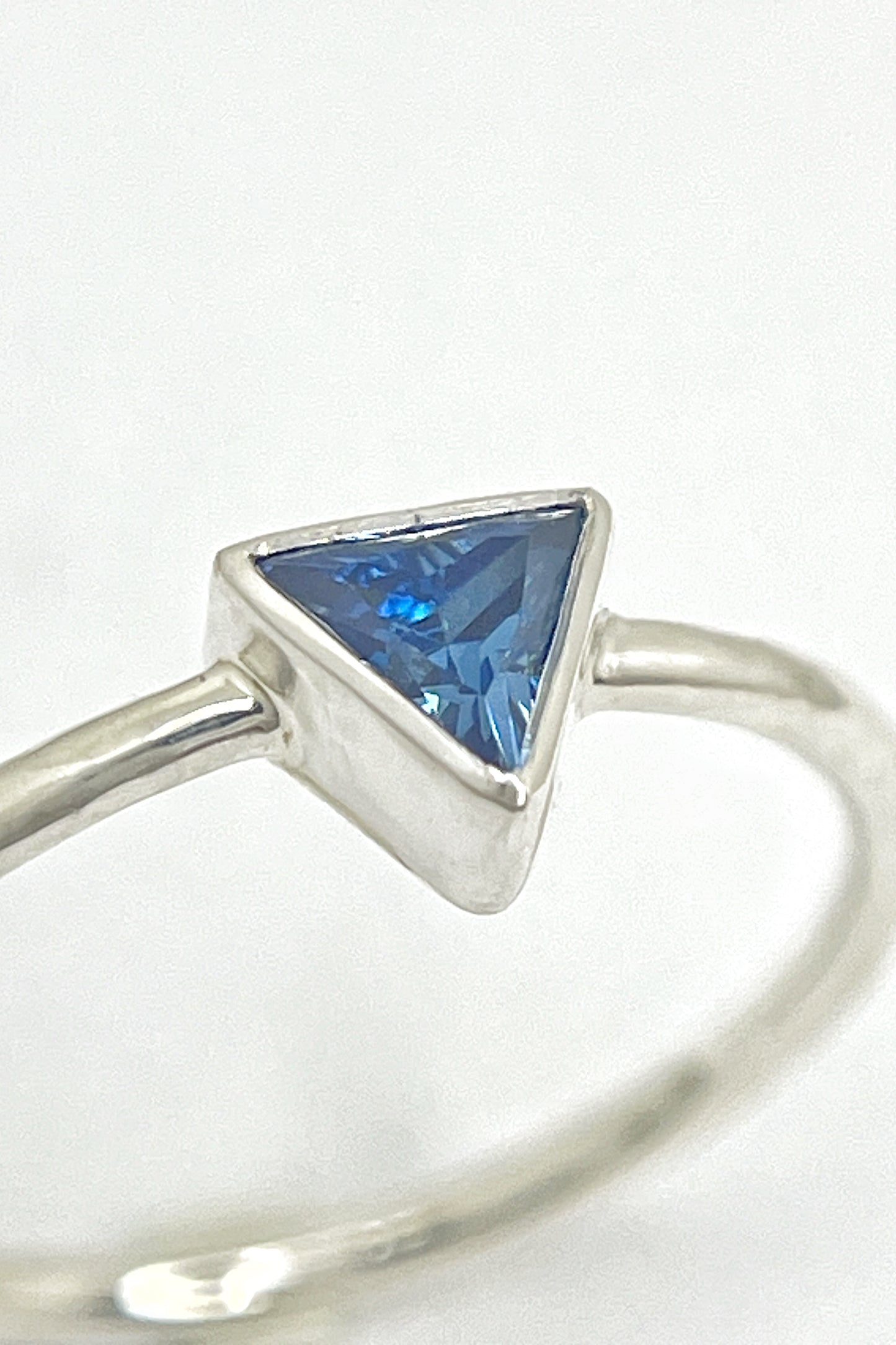 tiny triangle ring / blue cubic zirconia / size 8.5