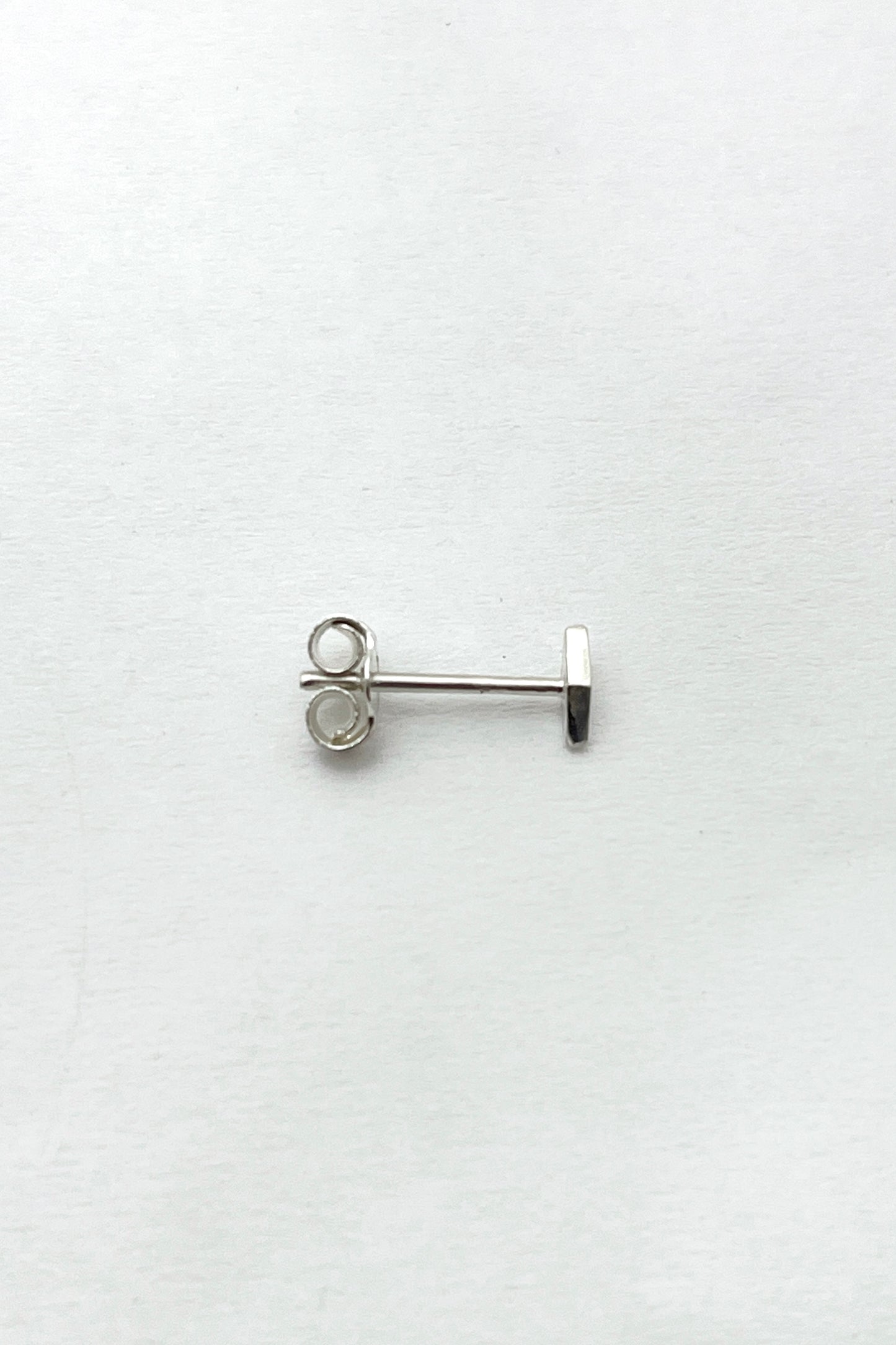 tiny geometric stud earrings