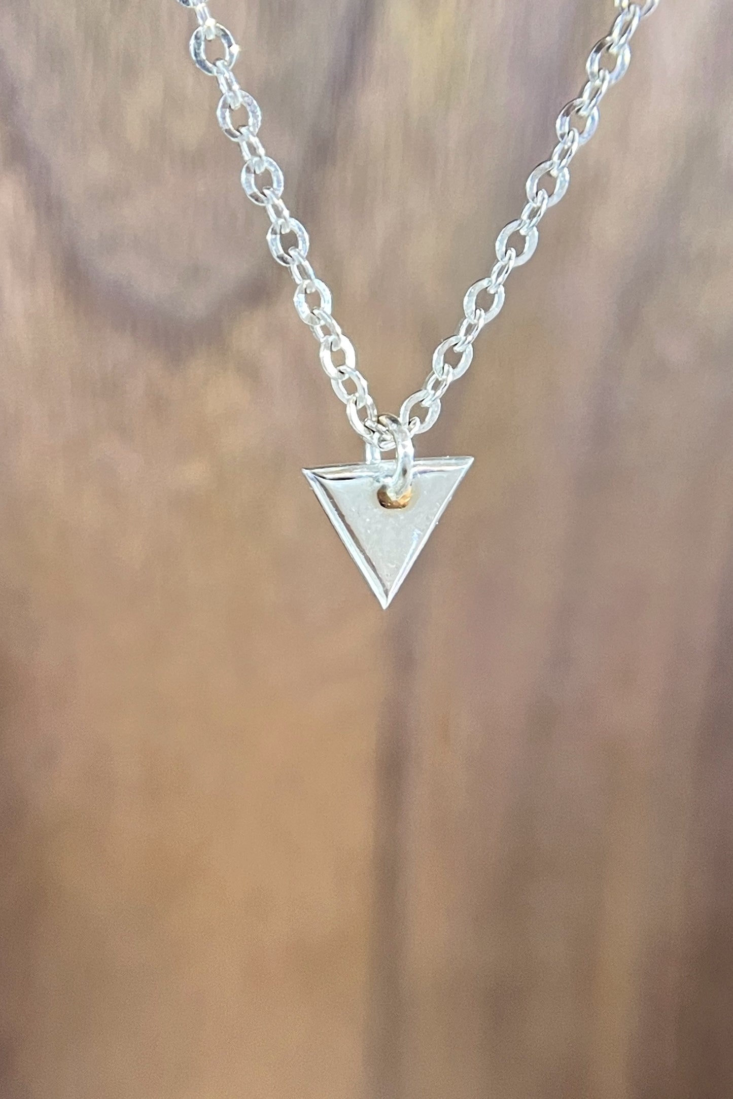 tiny silver triangle charm