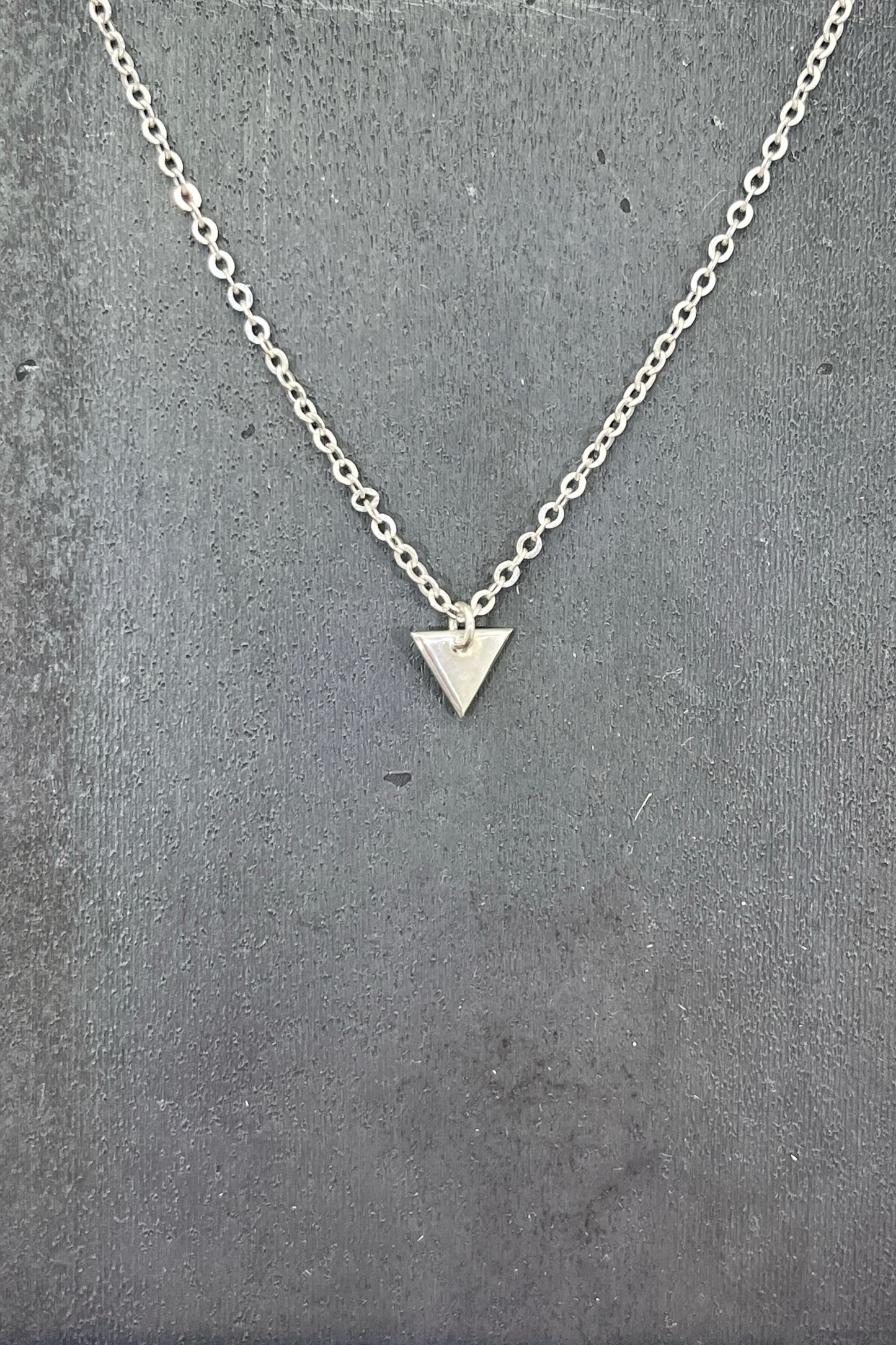 tiny silver triangle charm