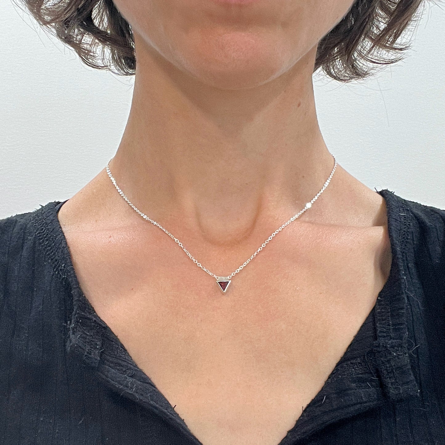 tiny triangle / red cubic zirconia