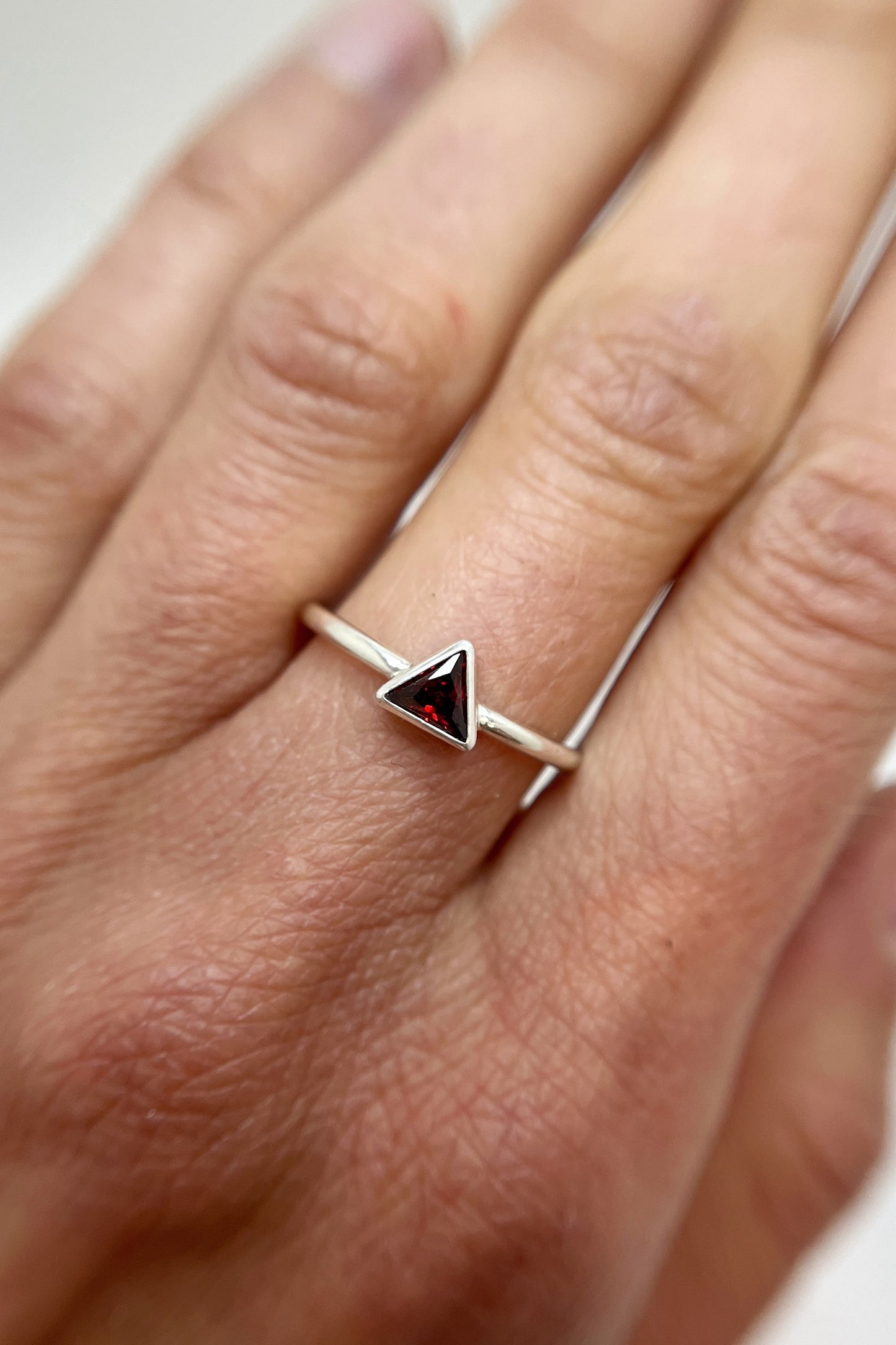 tiny triangle ring / red cubic zirconia / size 7