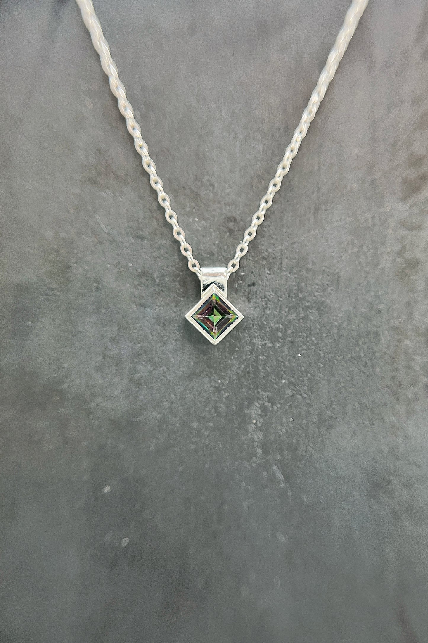 tiny rotated square / mystic topaz