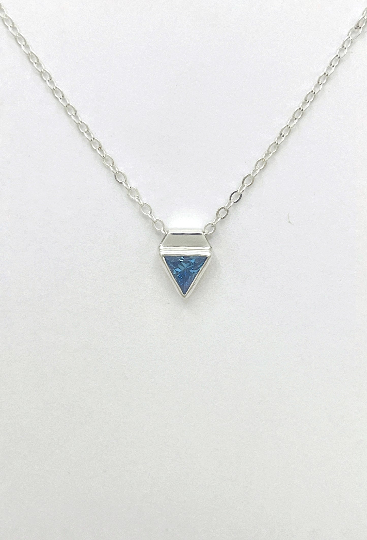 tiny triangle necklace / blue cubic zirconia