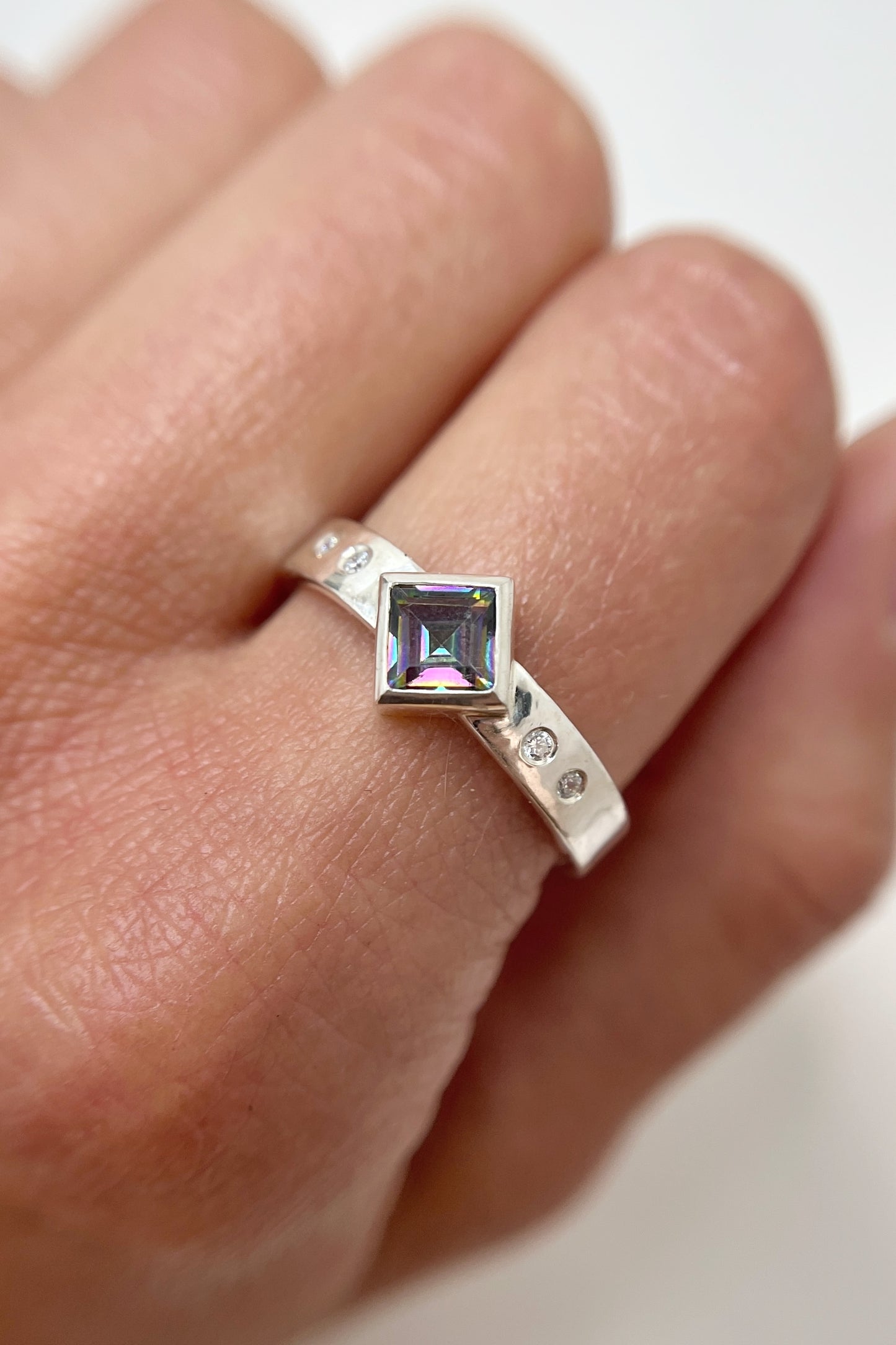 mystic topaz rotated square ring with flush sets / size 10