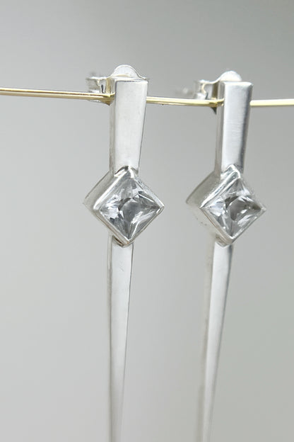 long spike earrings / white sapphire