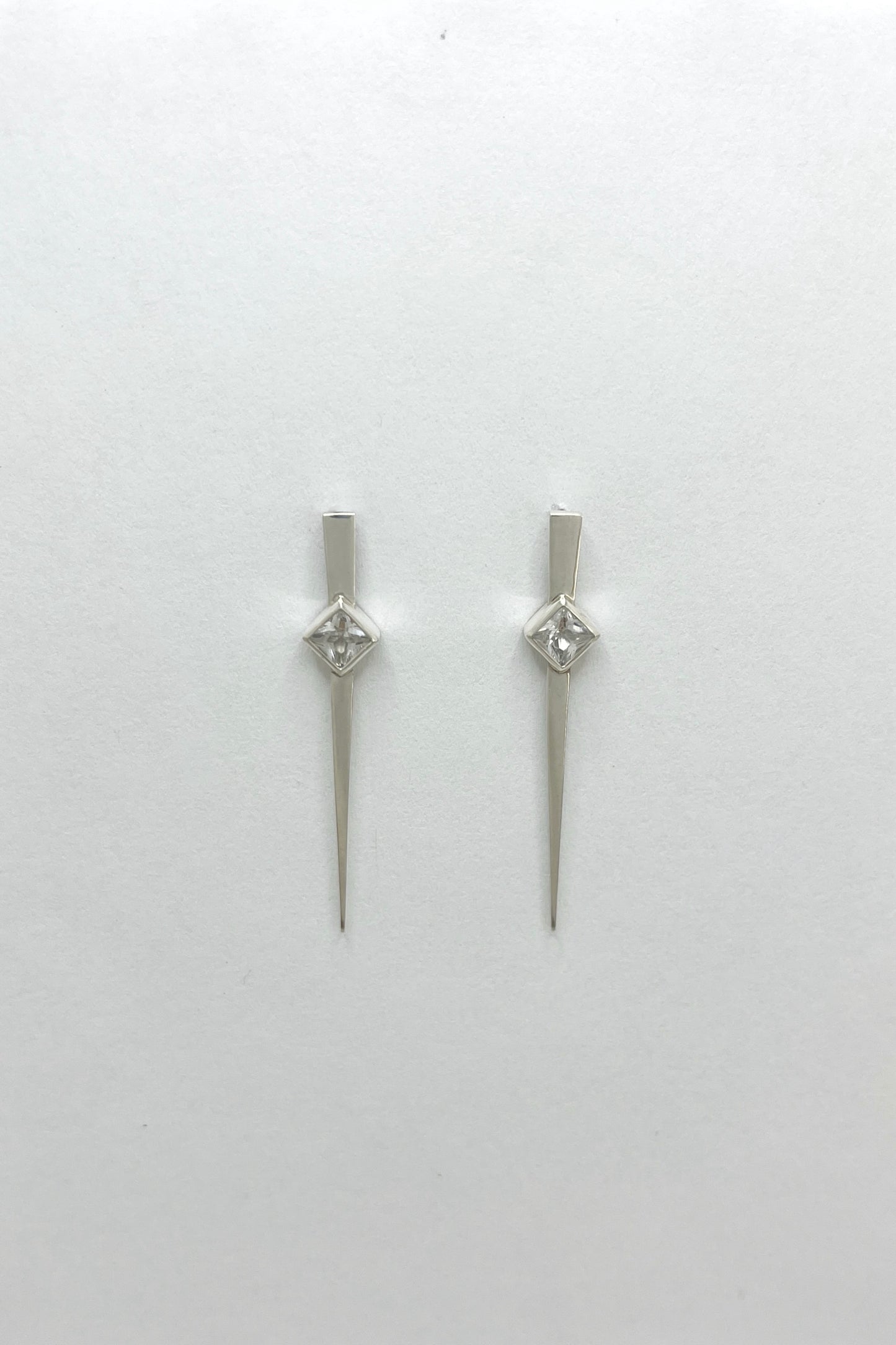 long spike earrings / white sapphire
