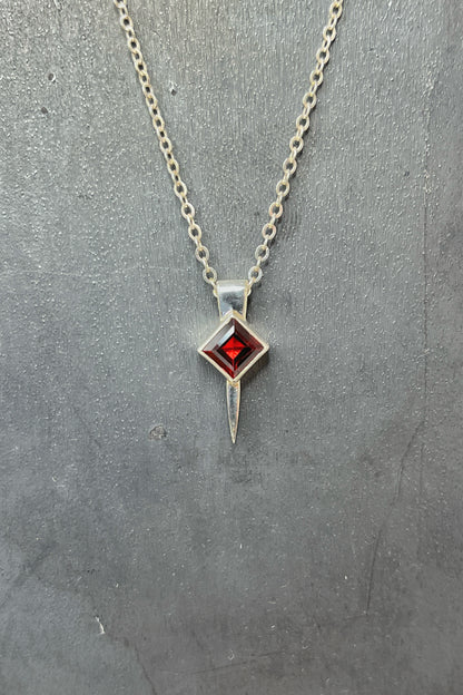 tiny square spike / garnet