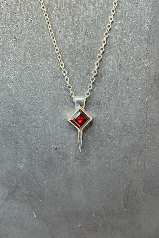 tiny square spike / garnet