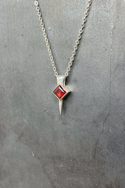 tiny square spike / garnet