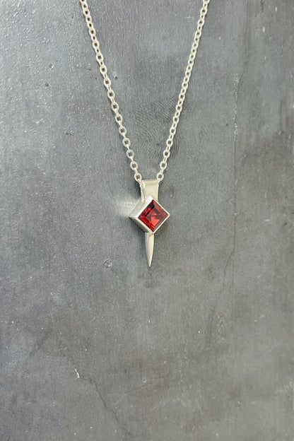 tiny square spike / garnet