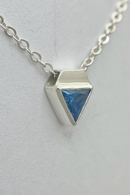 tiny triangle necklace / blue cubic zirconia