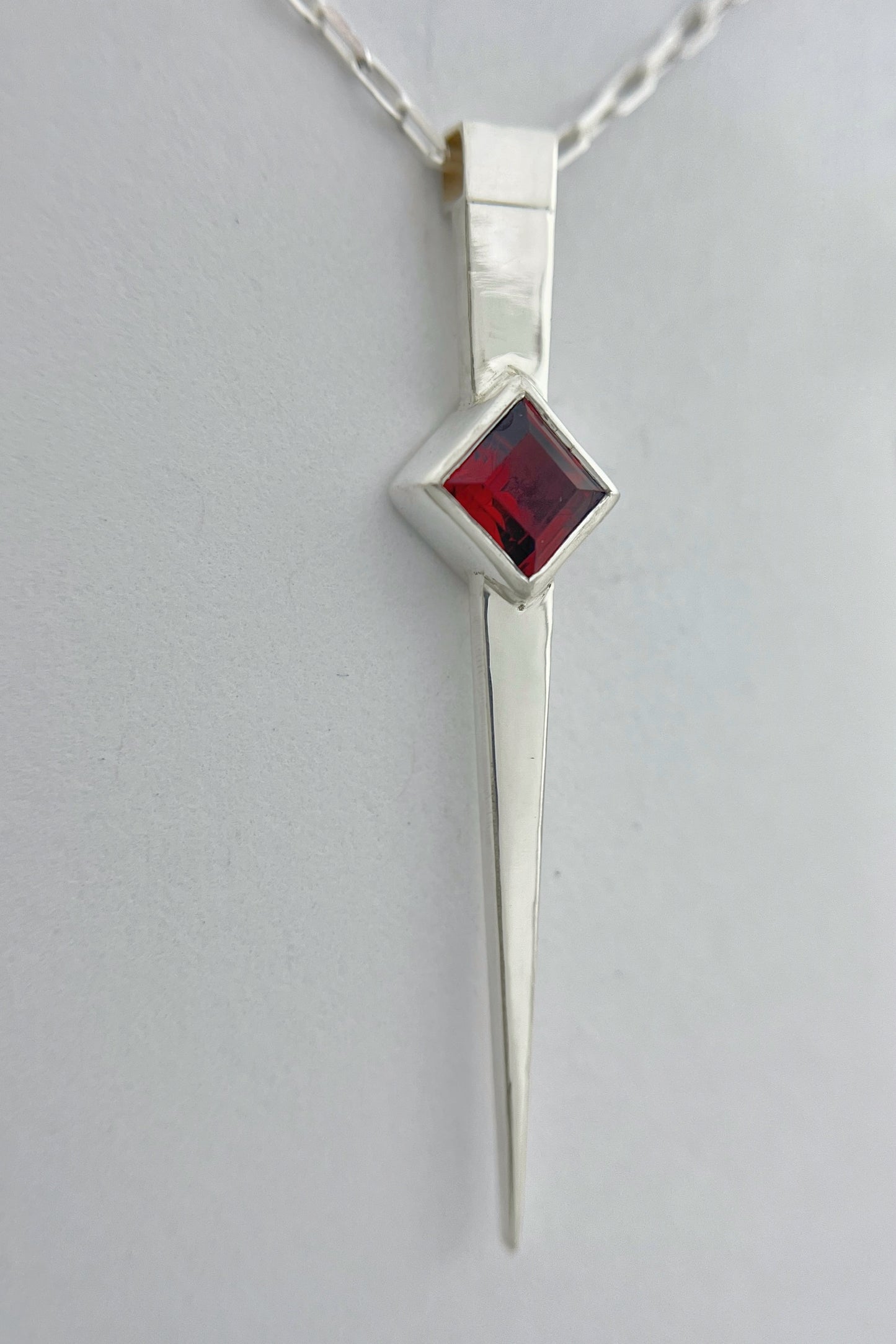 long spike necklace / garnet