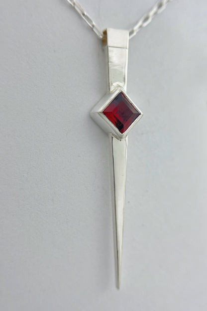 long spike necklace / garnet