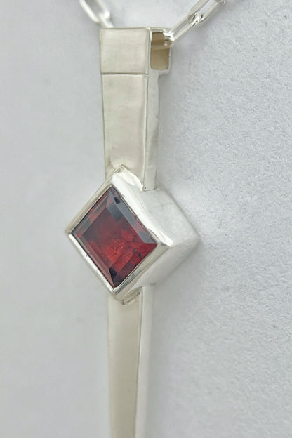 long spike necklace / garnet