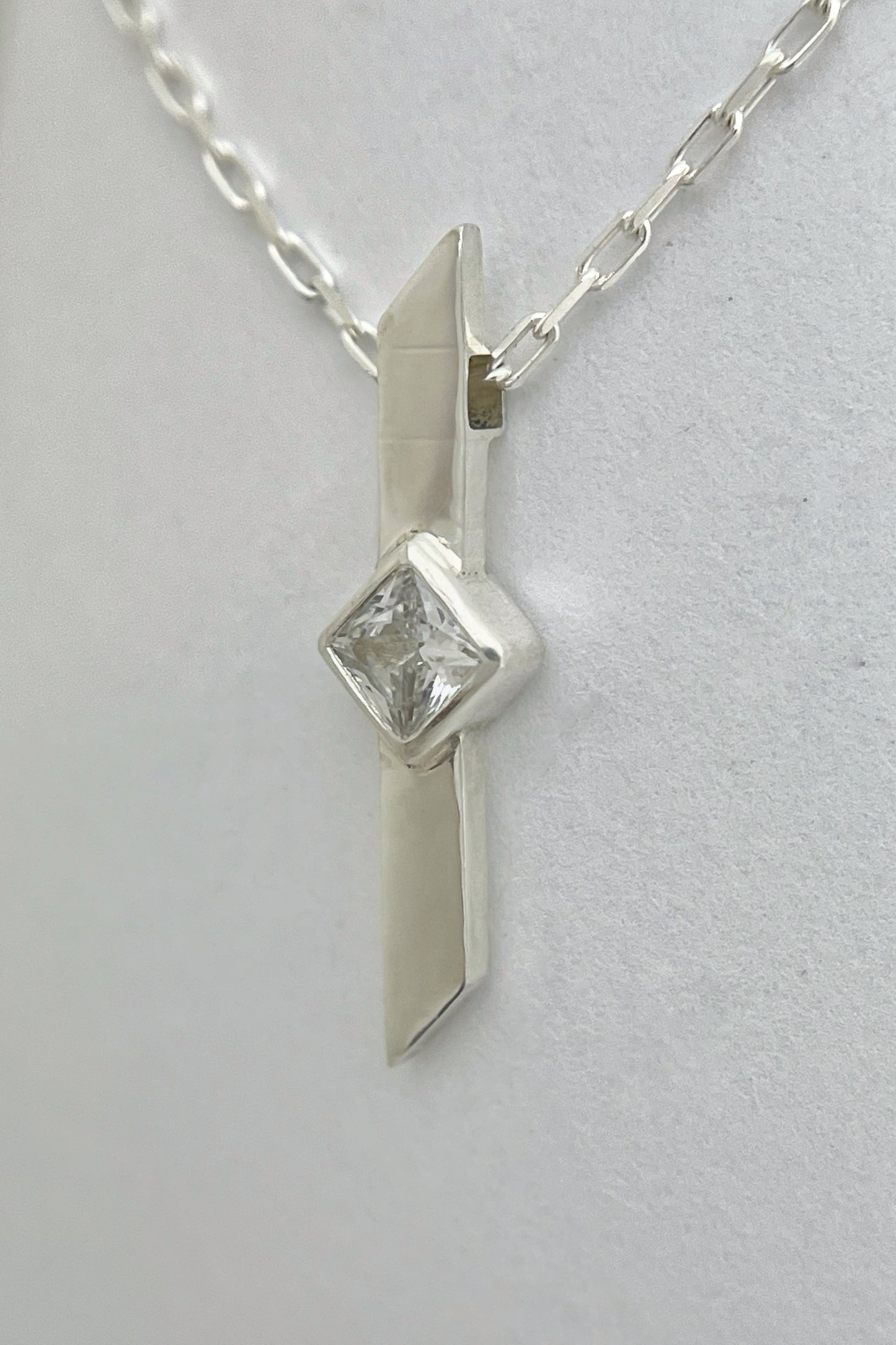 warp necklace / white cubic zirconia