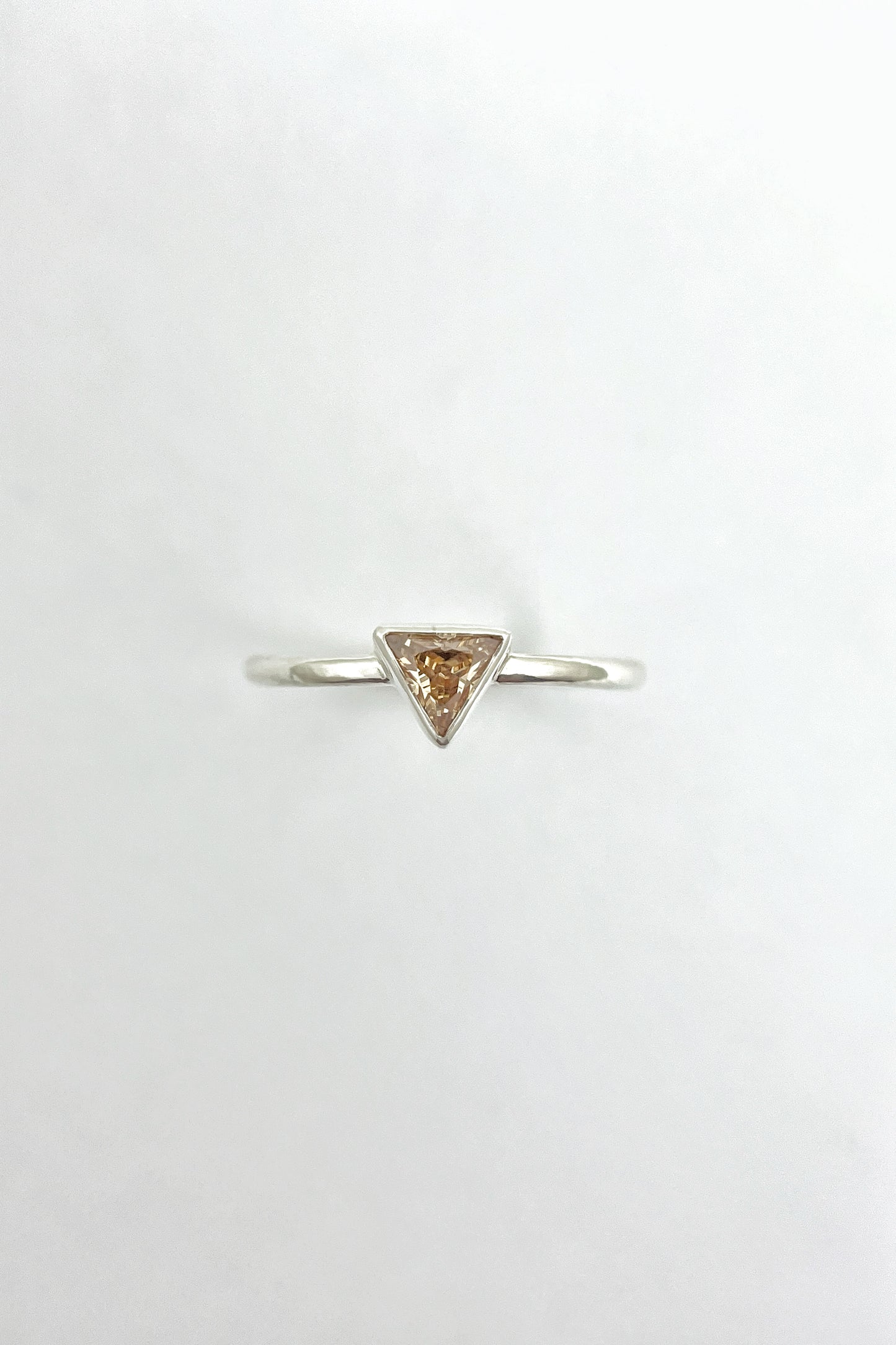 tiny triangle ring / orange cubic zirconia / size 8