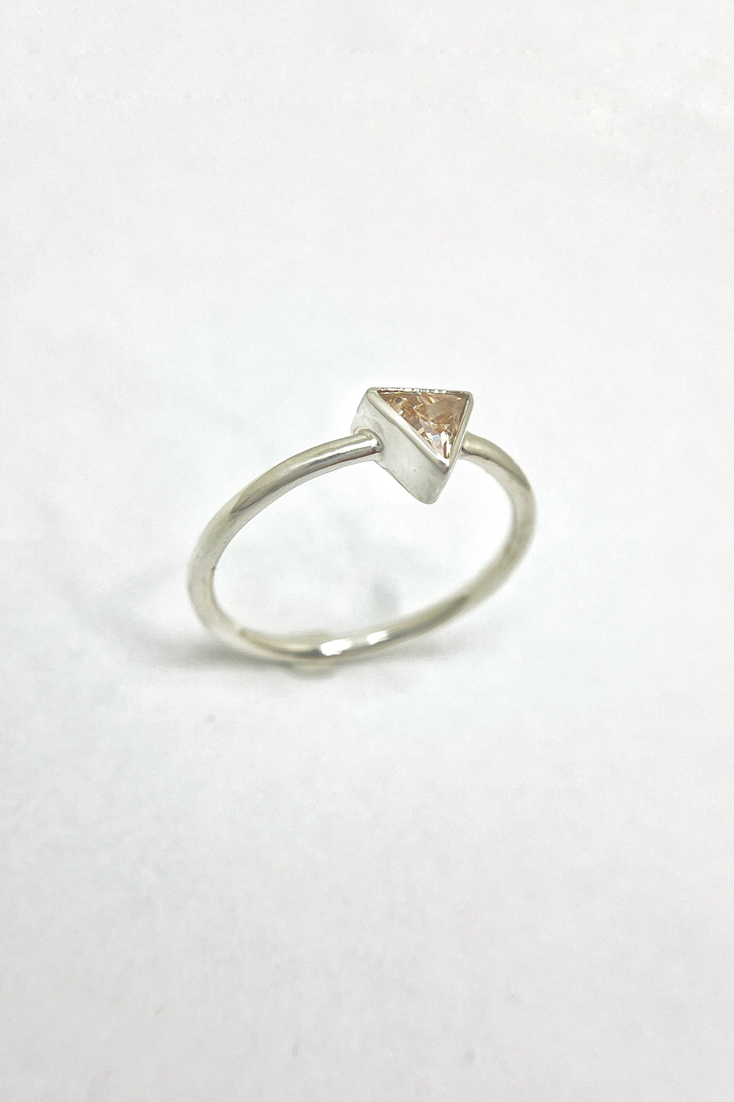 tiny triangle ring / orange cubic zirconia / size 8