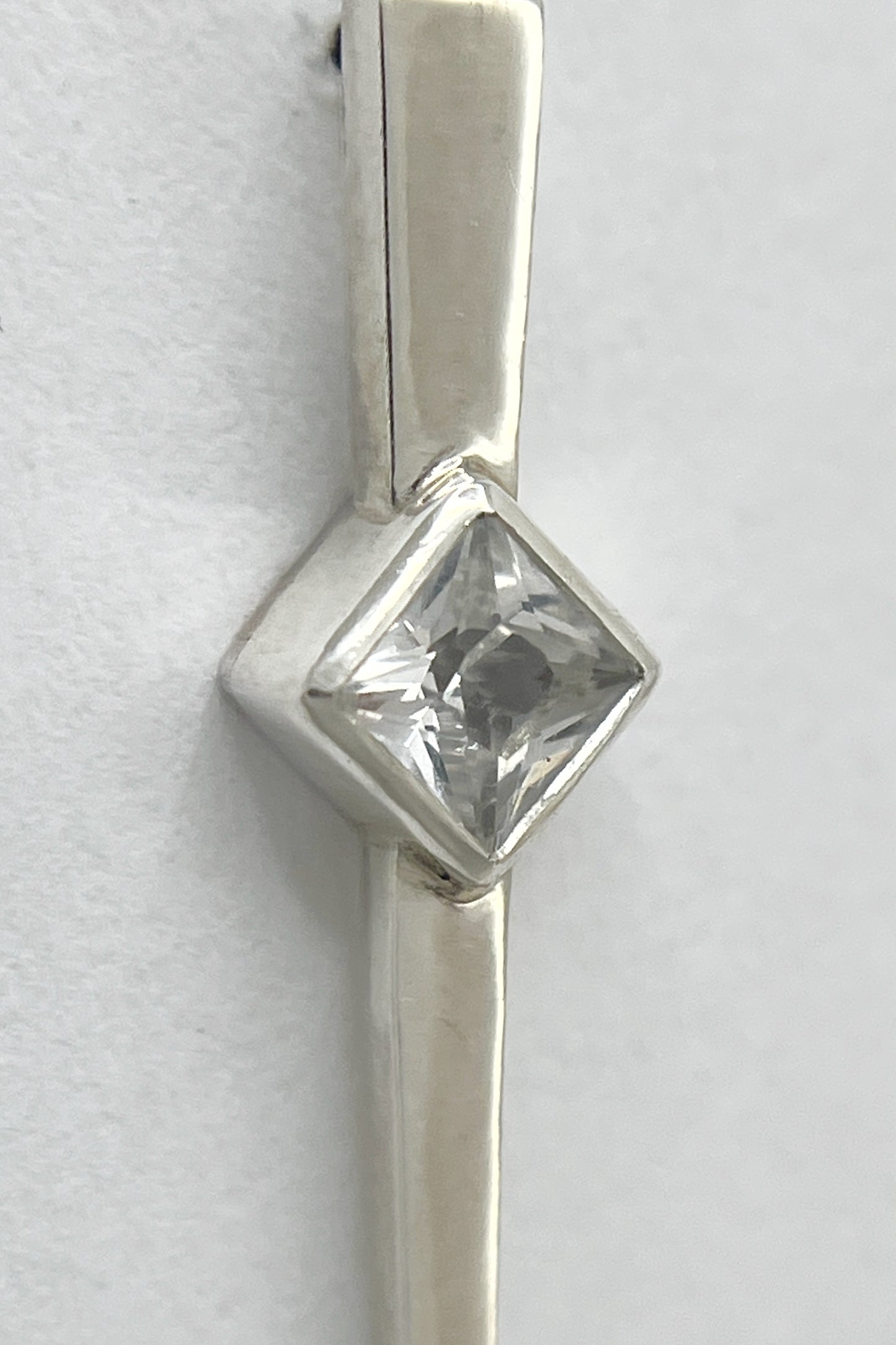 long spike earrings / white sapphire