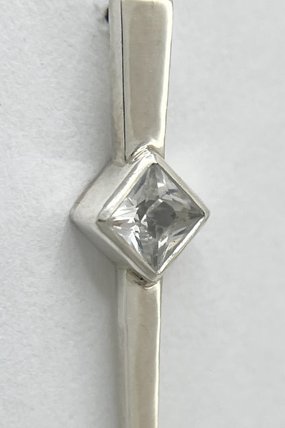 long spike earrings / white sapphire