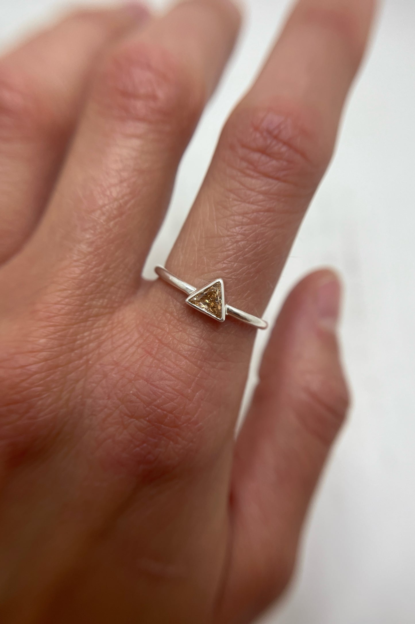 tiny triangle ring / orange cubic zirconia / size 8