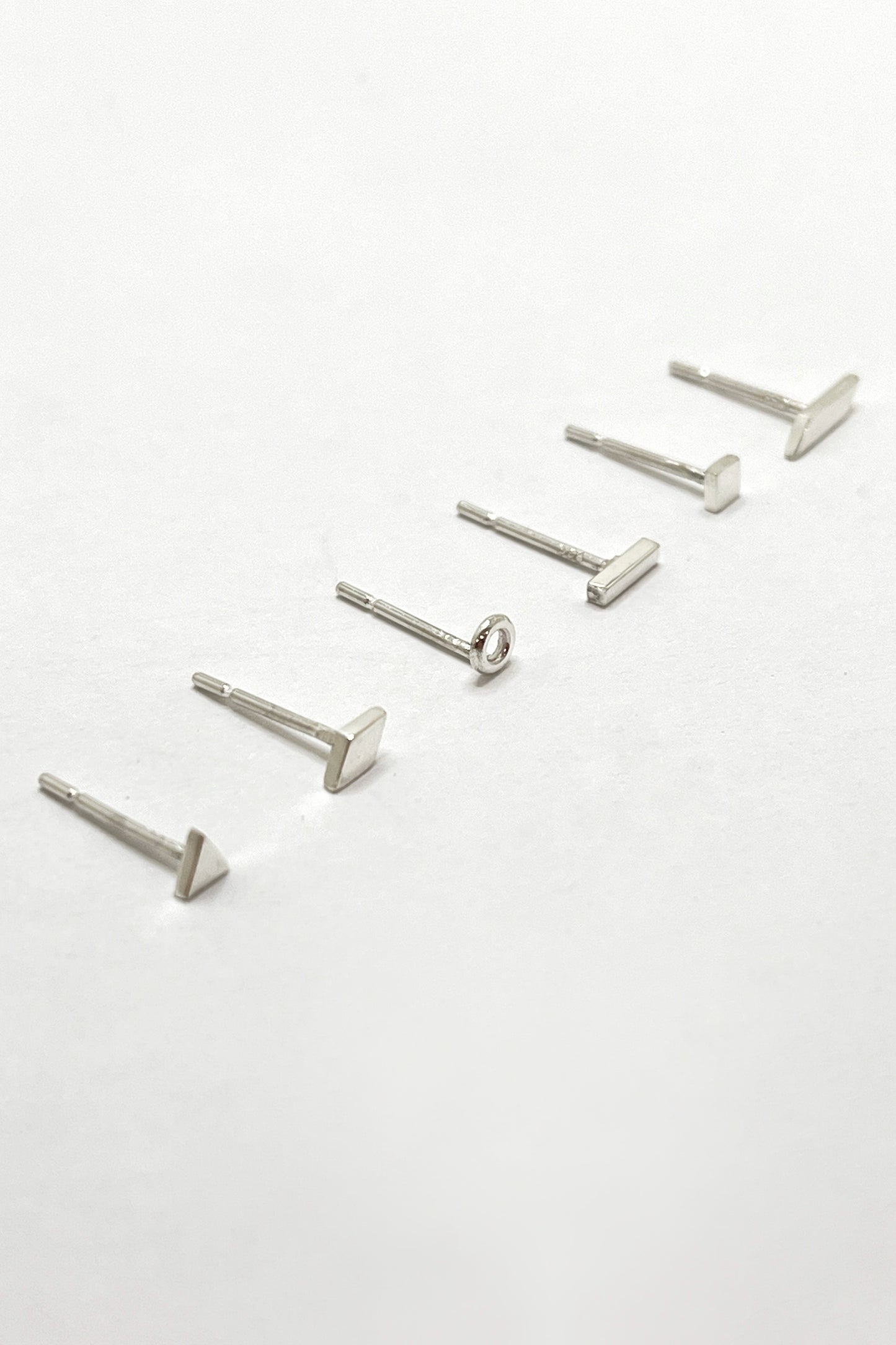 tiny geometric stud earrings