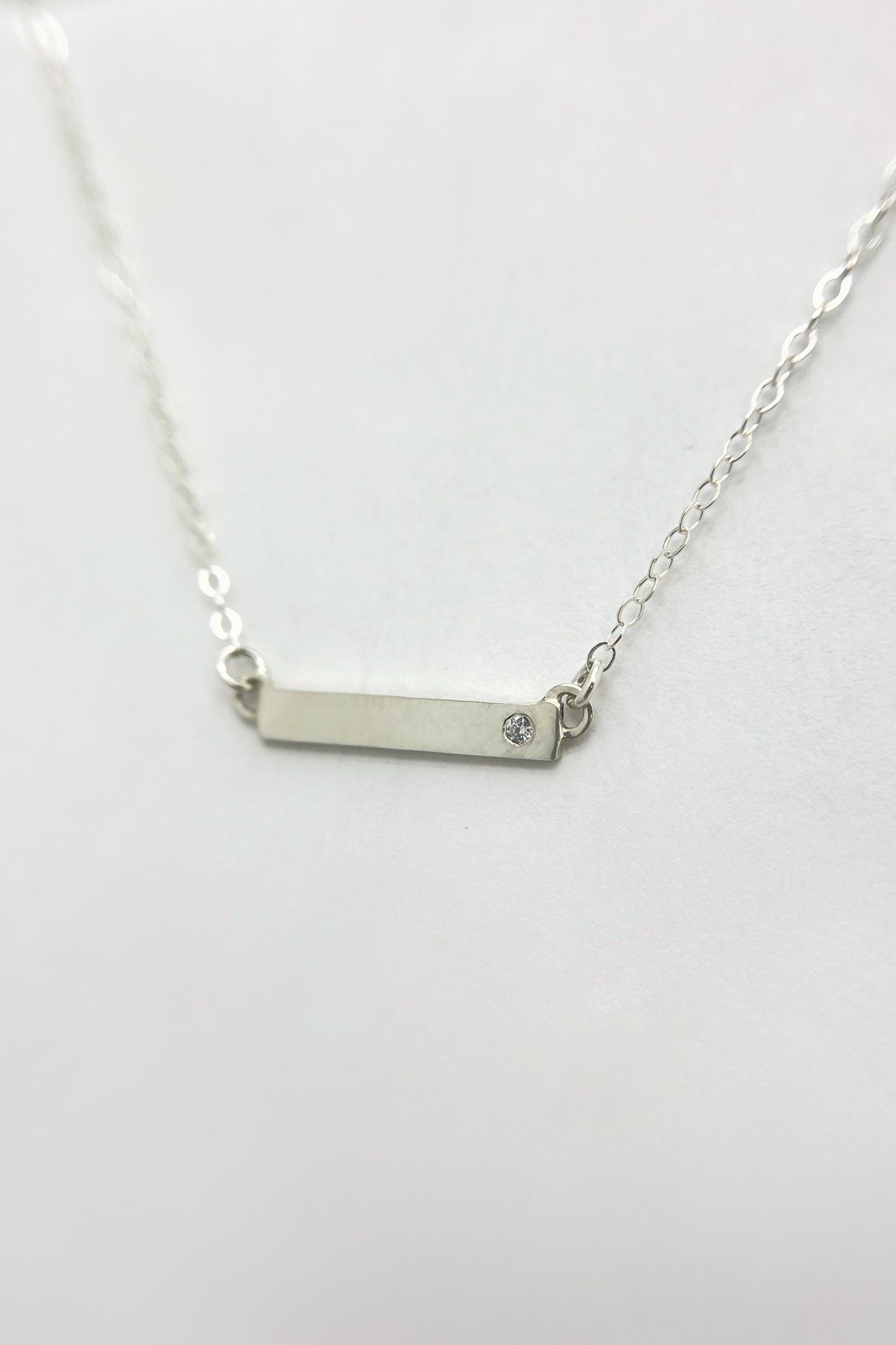 bar necklace / white cubic zirconia