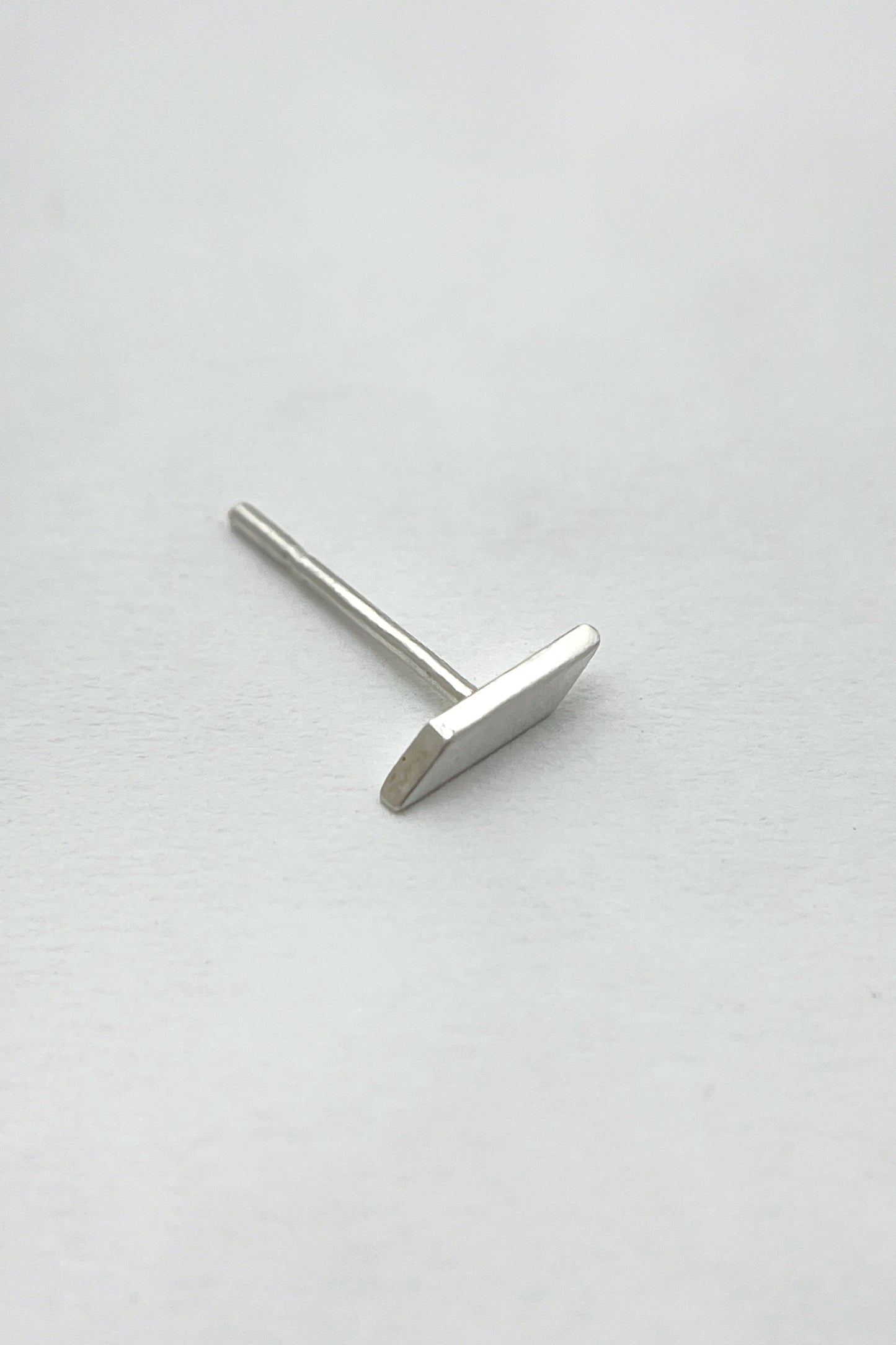 tiny geometric stud earrings