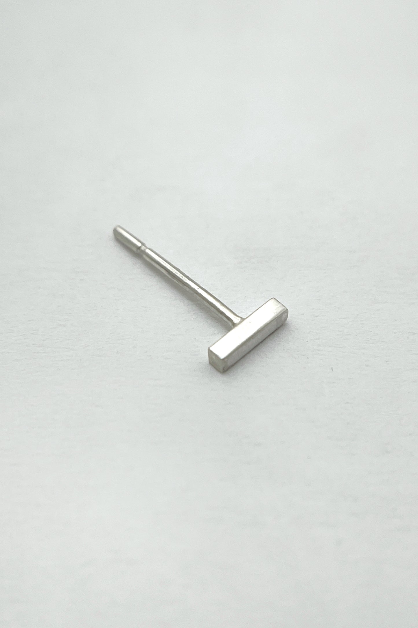 tiny geometric stud earrings