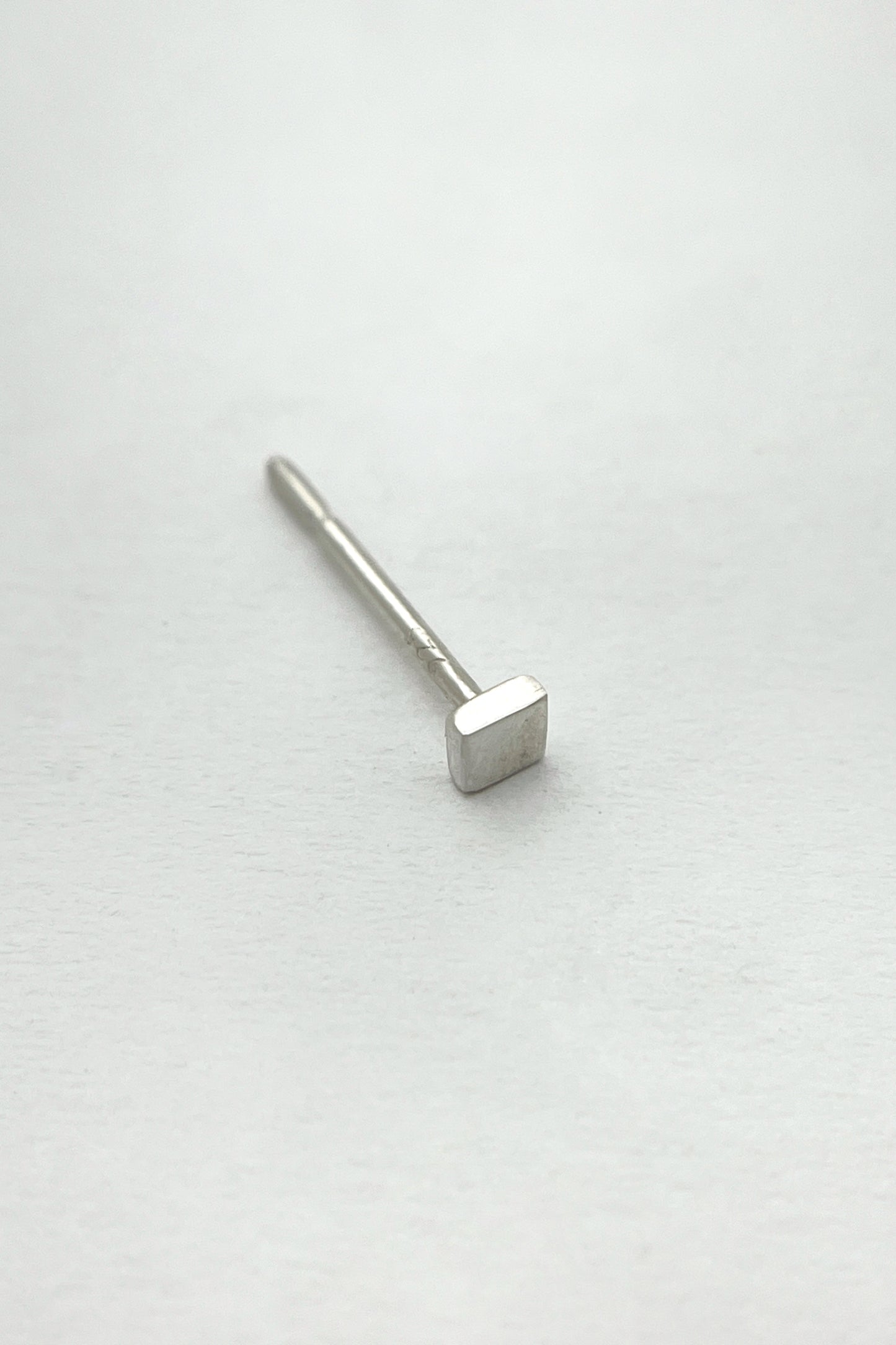 tiny geometric stud earrings