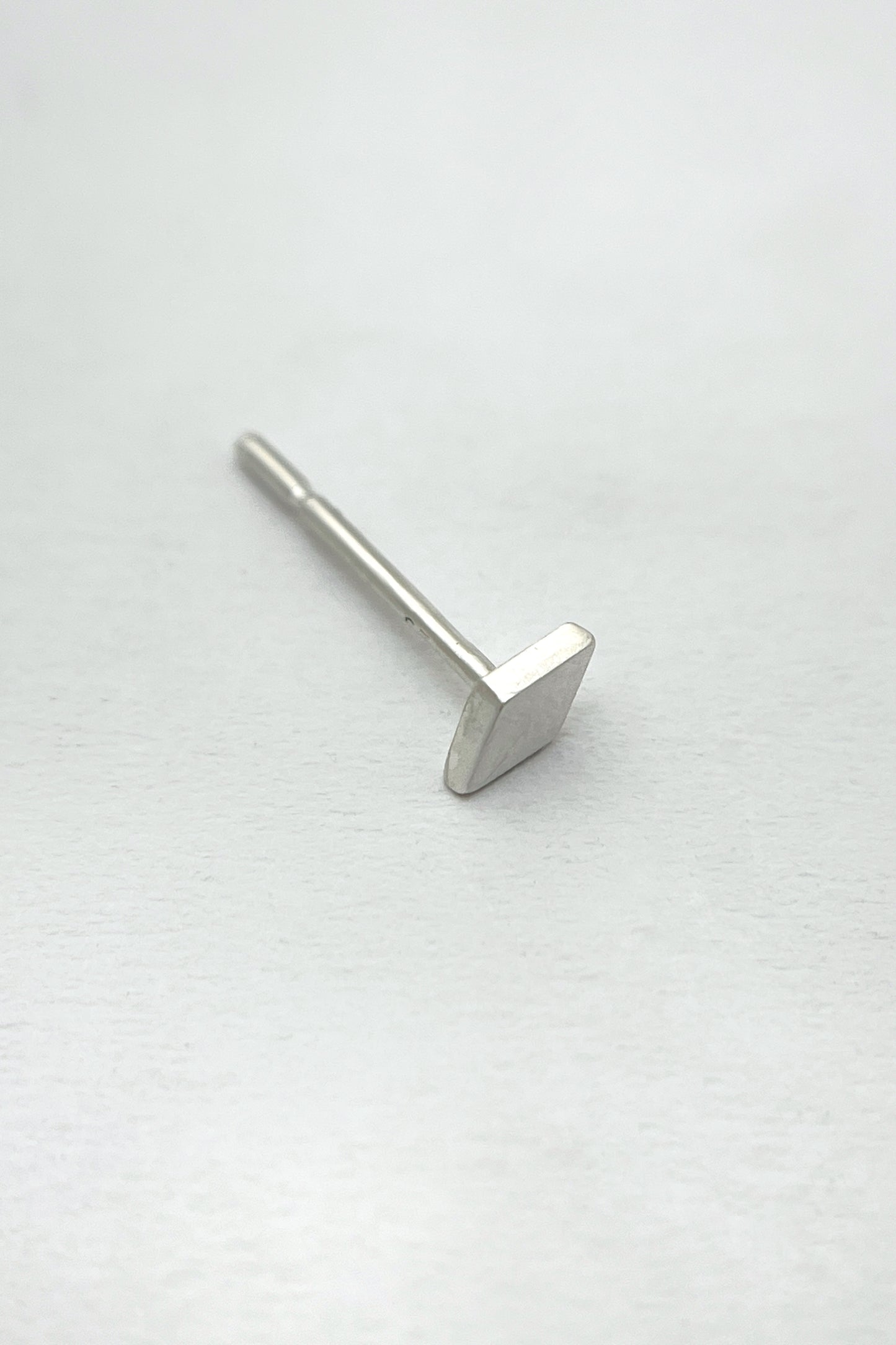 tiny geometric stud earrings