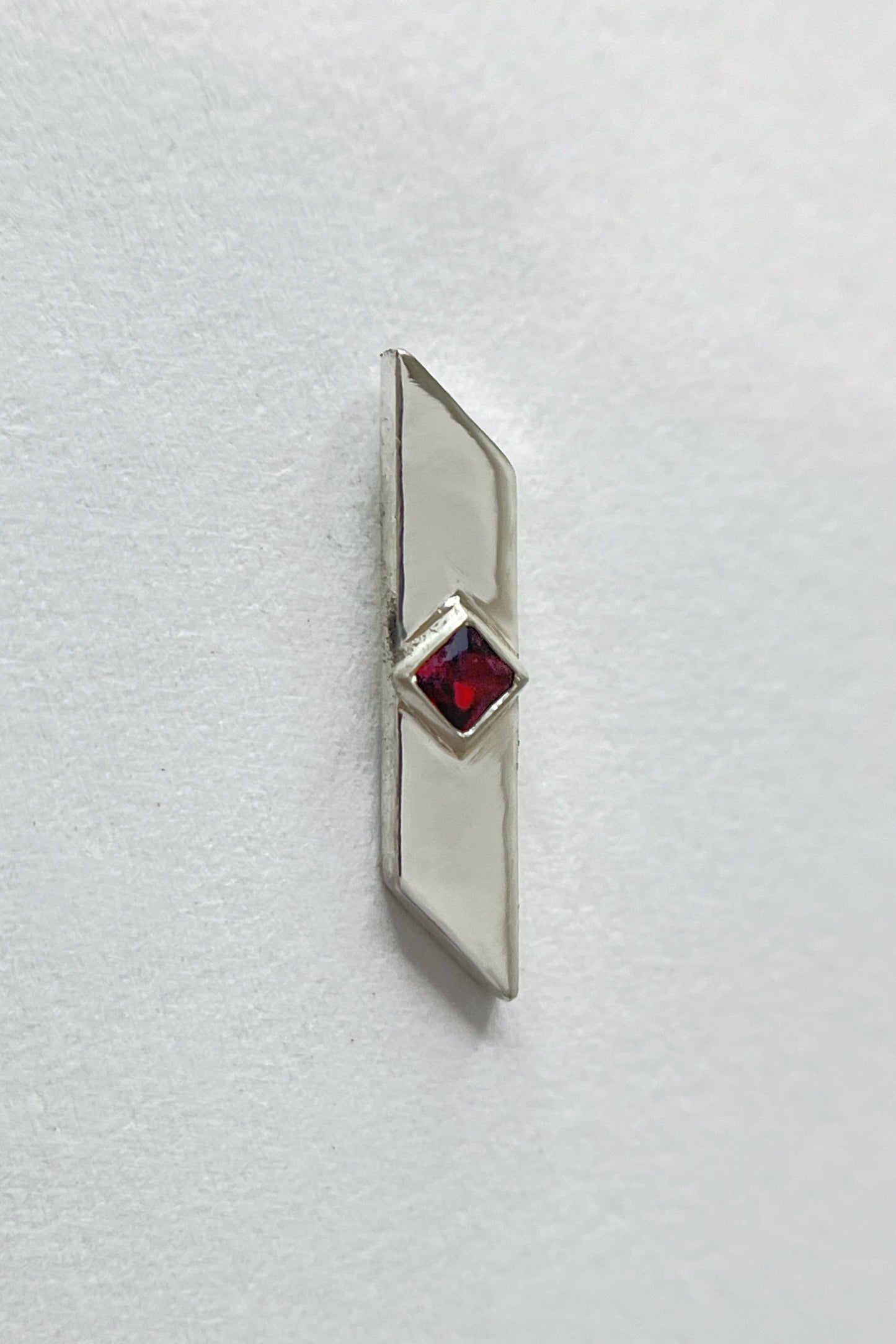 warp stud earrings / garnet