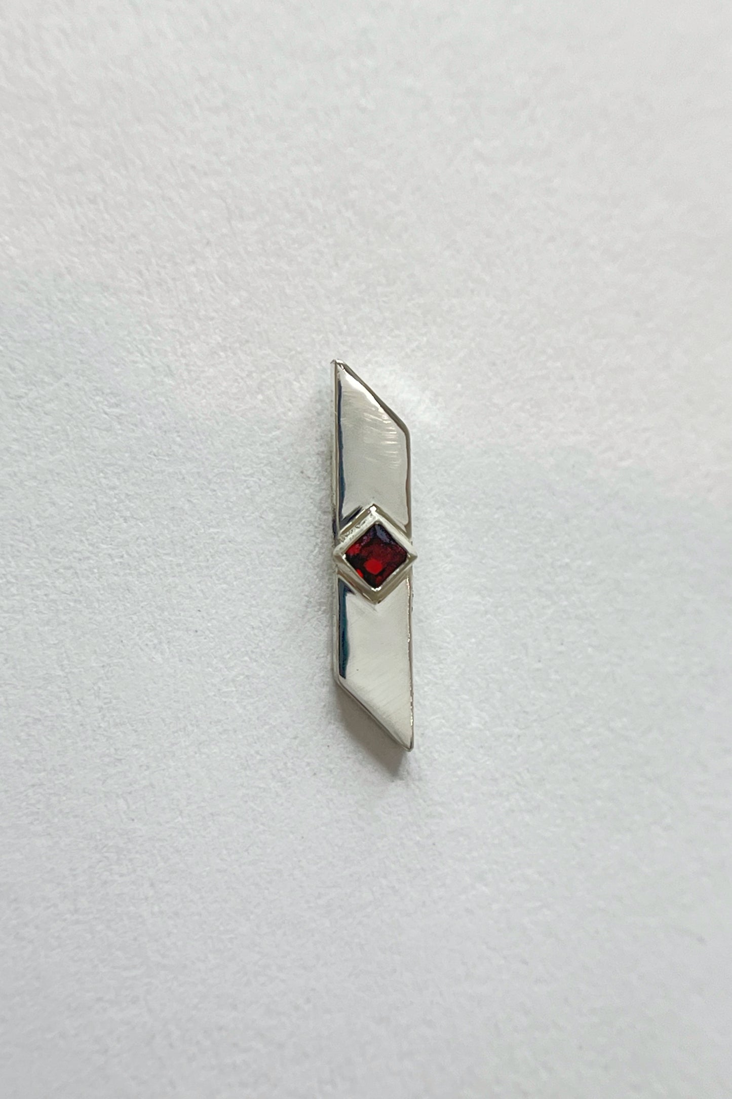 warp stud earrings / garnet