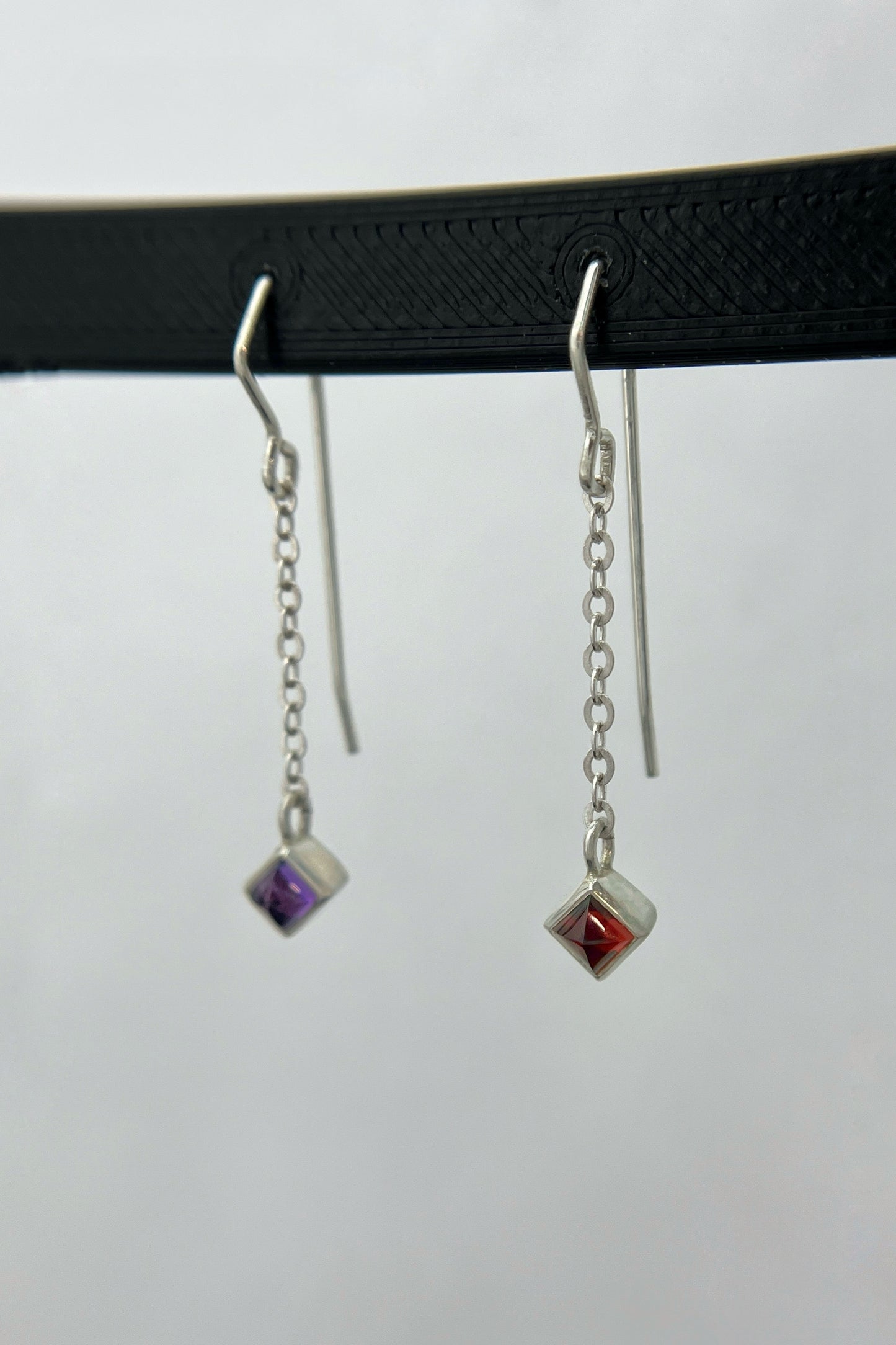 sugarloaf dangle earrings / garnet & amethyst