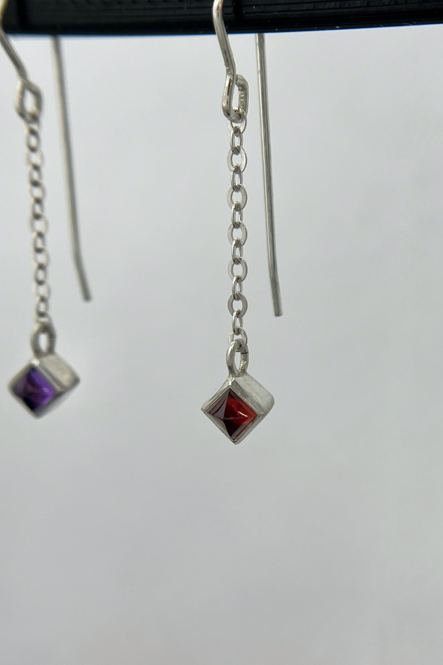 sugarloaf dangle earrings / garnet & amethyst