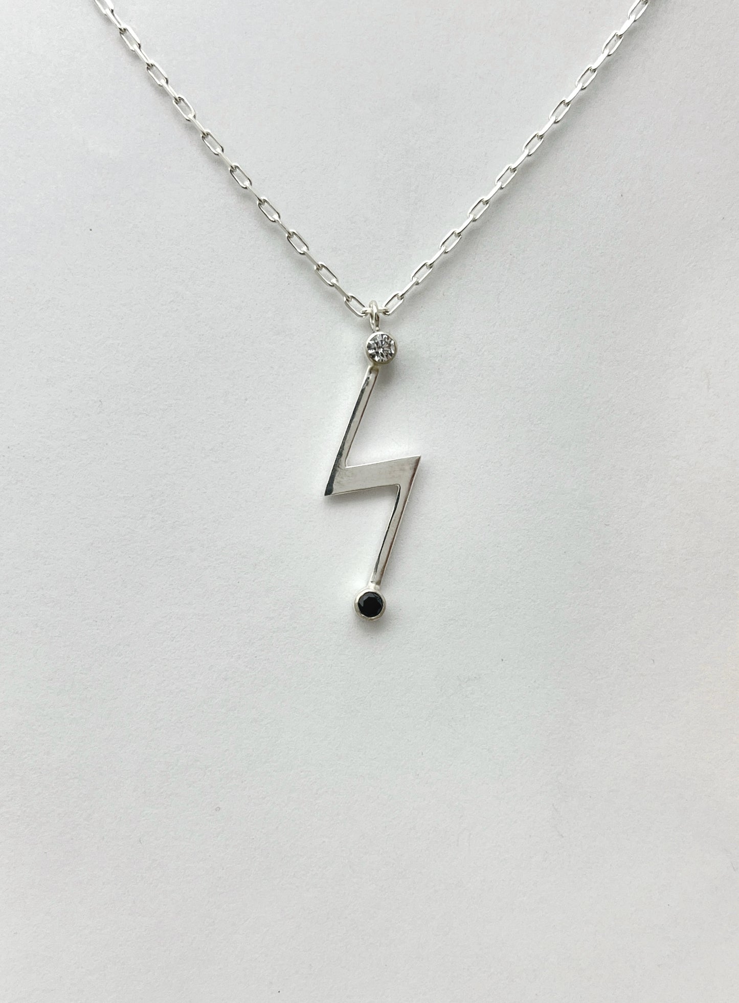 lightning bolt necklace / white cz & black spinel